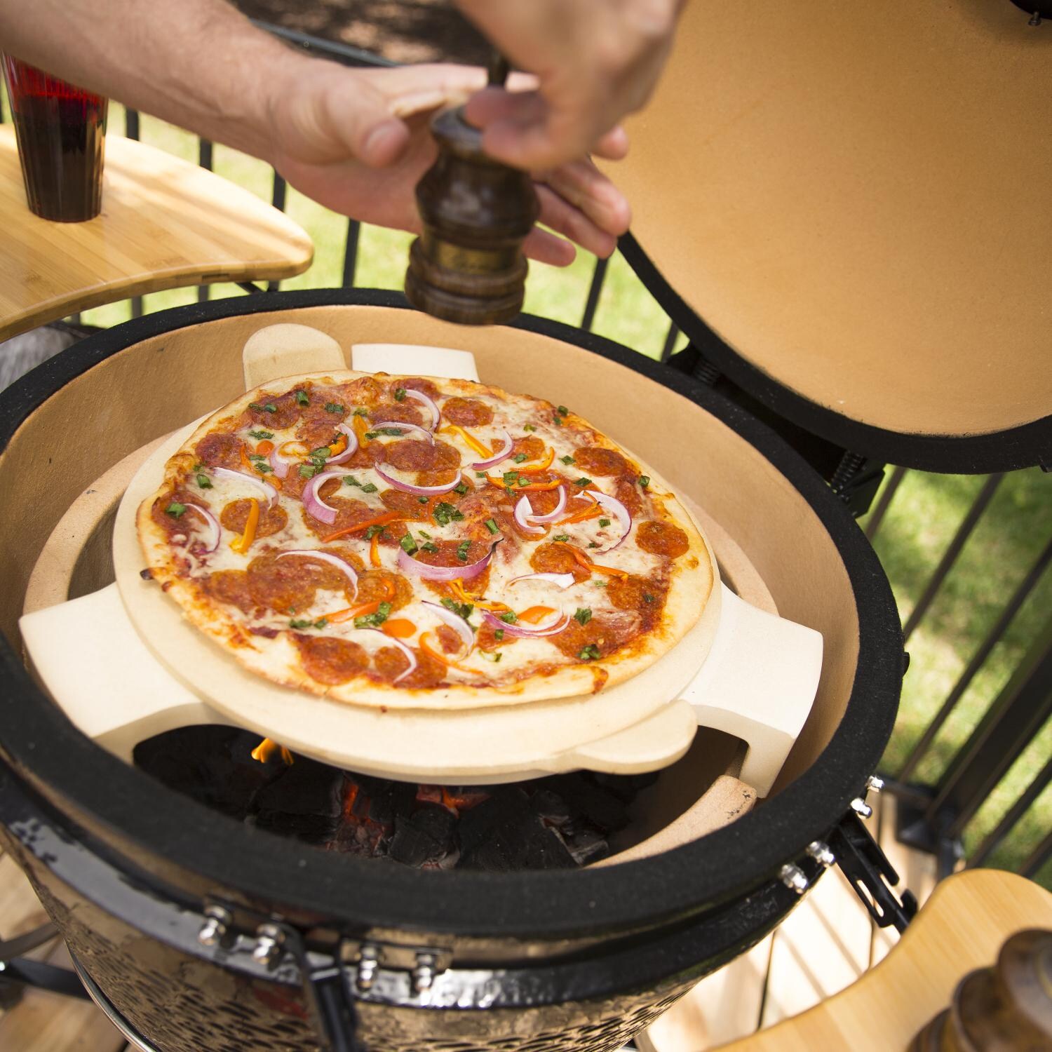 Pit Boss - 71220 - 22-Inch Ceramic Kamado Grill - Cooking a Pizza thumbnail