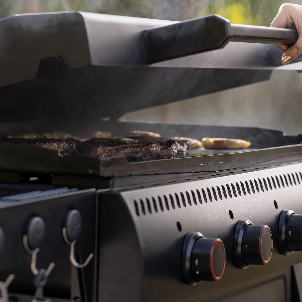 Camp Chef FTG36 36 Inch Gridiron Griddle - Checking Food - Lifestyle thumbnail