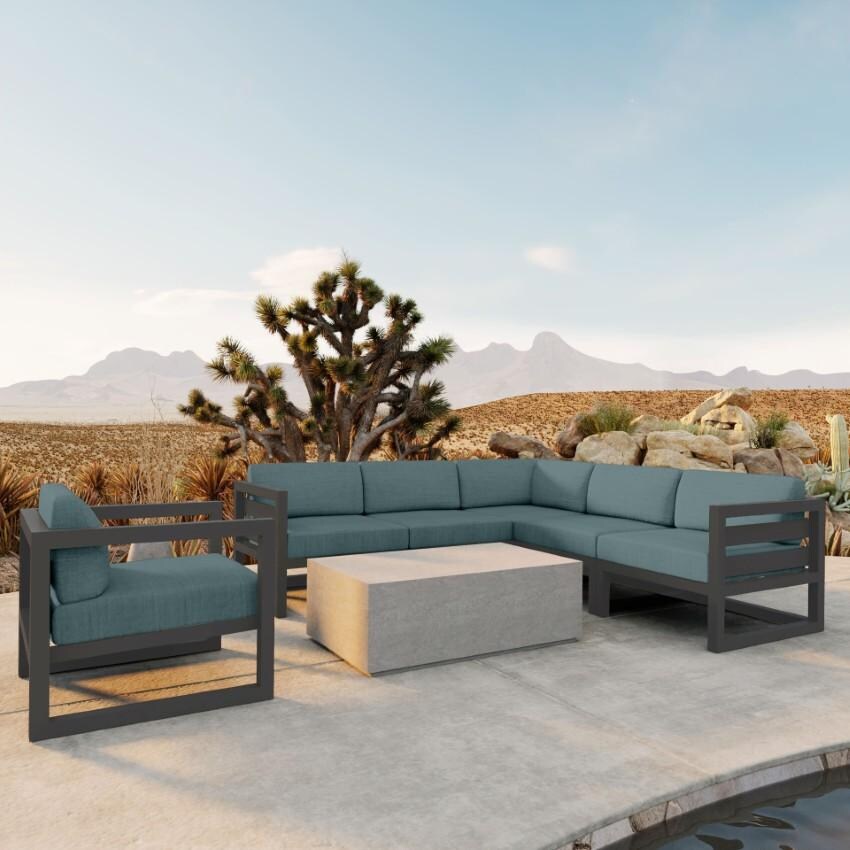 Misty Cove 7 Piece Sectional Set in Slate w/Coffee Table & Cast Lagoon Cushions by Lakeview - On the Patio - Lifestyle thumbnail