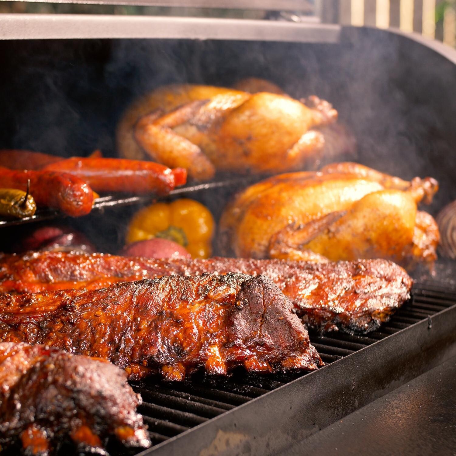 Victory BBQ-PG + BBQ-PG-CVR + BBQ-PLT20-HK + BBQ-PLT20-MQ + BBQ-PLT20-AP 35-Inch Wood Pellet Grill, Cover, & 20 Lb. Hardwood Pellets Ultimate Starter Pack - Smoking a Variety - Lifestyle thumbnail