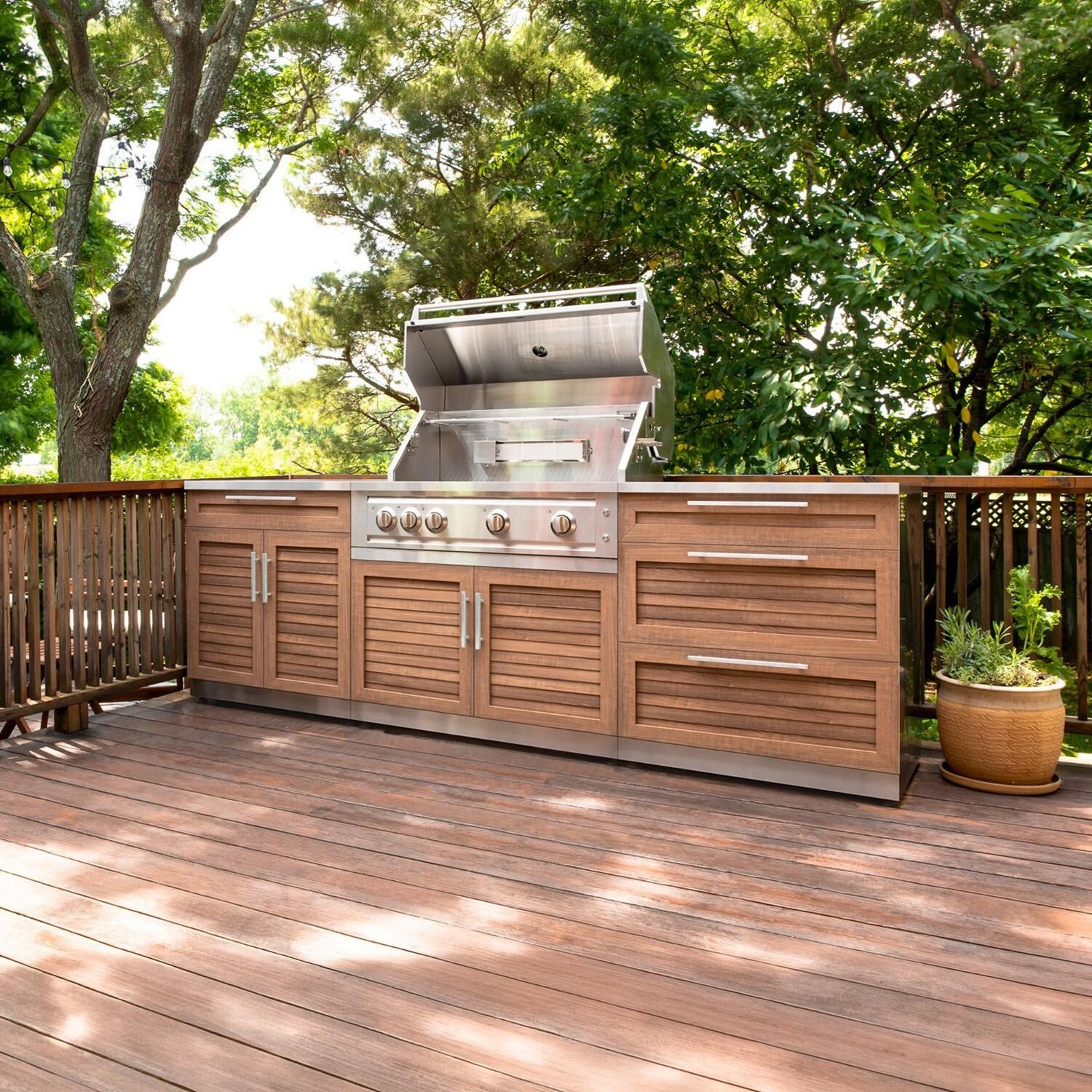 NewAge Products 71054 Classic Series 8 Ft Outdoor Kitchen Island w/ 33-in Propane Grill, Trash Bin, Door & Drawer in Grove/Stainless Steel - Open on Patio - Lifestyle thumbnail