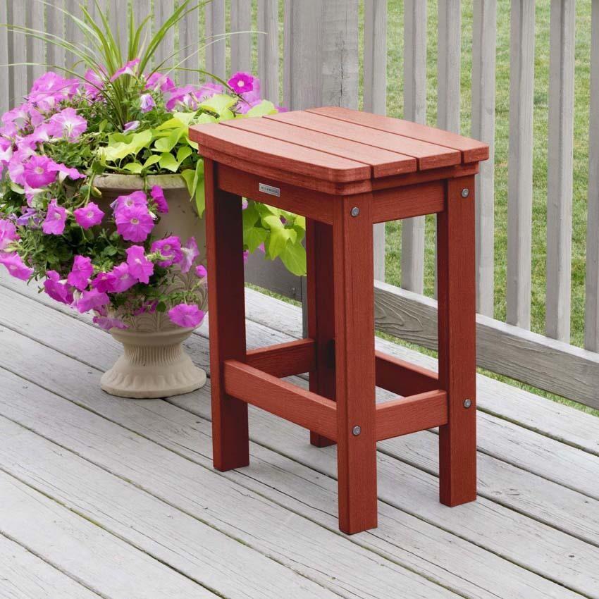 Hart Lane Polyresin Bar Stool Counter Height in Rustic Red By Lakeview Outdoor Designs - Angled - Lifestyle thumbnail