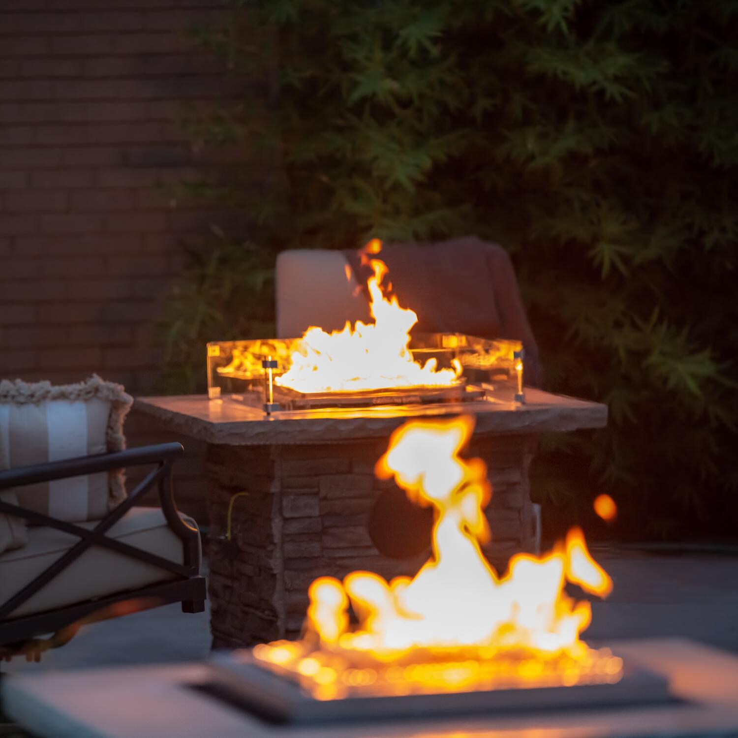 Blazing Beats Laguna Stacked Stone 38 Inch Fire Table - Fire View at Night thumbnail