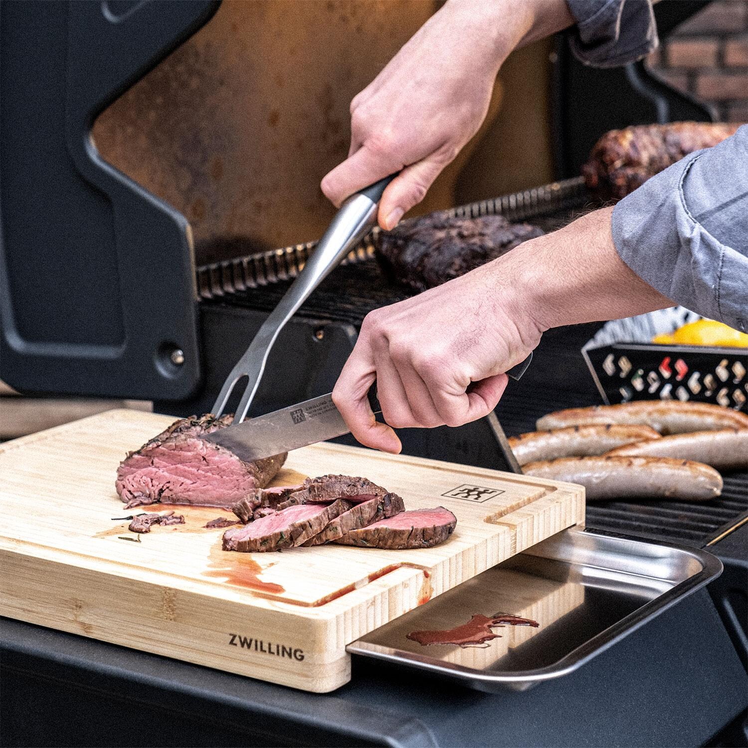 Zwilling Henckels Cutlery 1026185 BBQ+ Bamboo Cutting Board W/ Tray - Cutting Meat - Lifestyle thumbnail