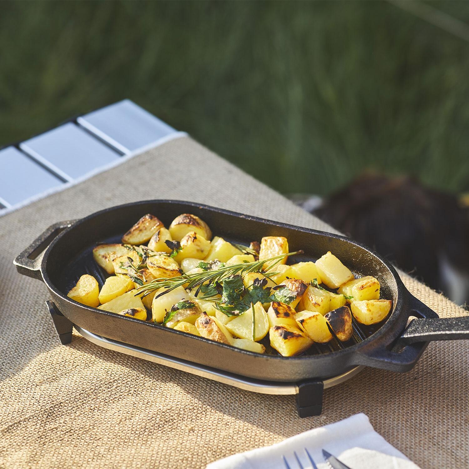 Ooni UU-P1AA00 Cast Iron Grizzler Pan - Potatoes in Pan - Lifestyle thumbnail