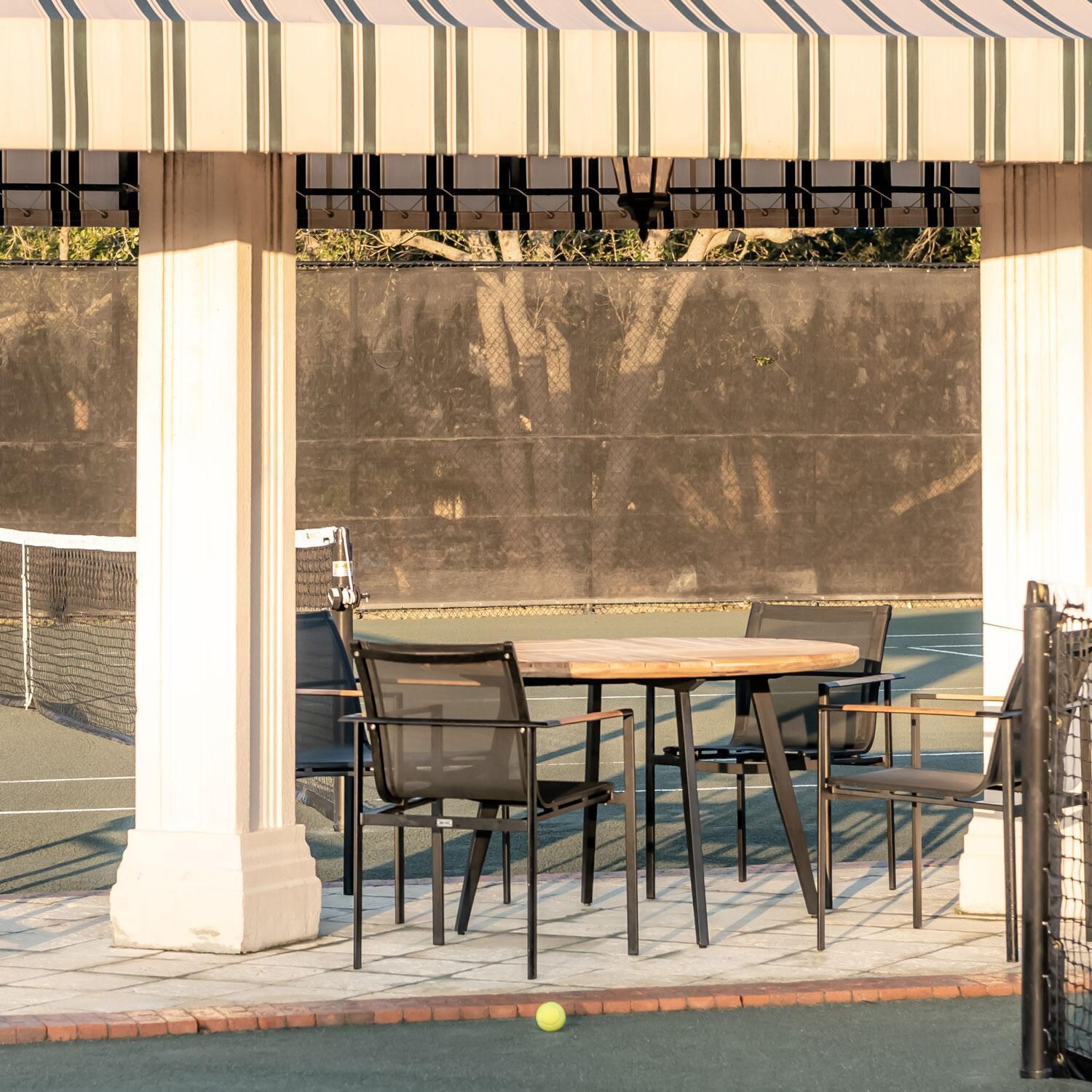 Teak + Table St Barts 48 Inch Aluminum Round Dining Table - Courtside - Lifestyle thumbnail