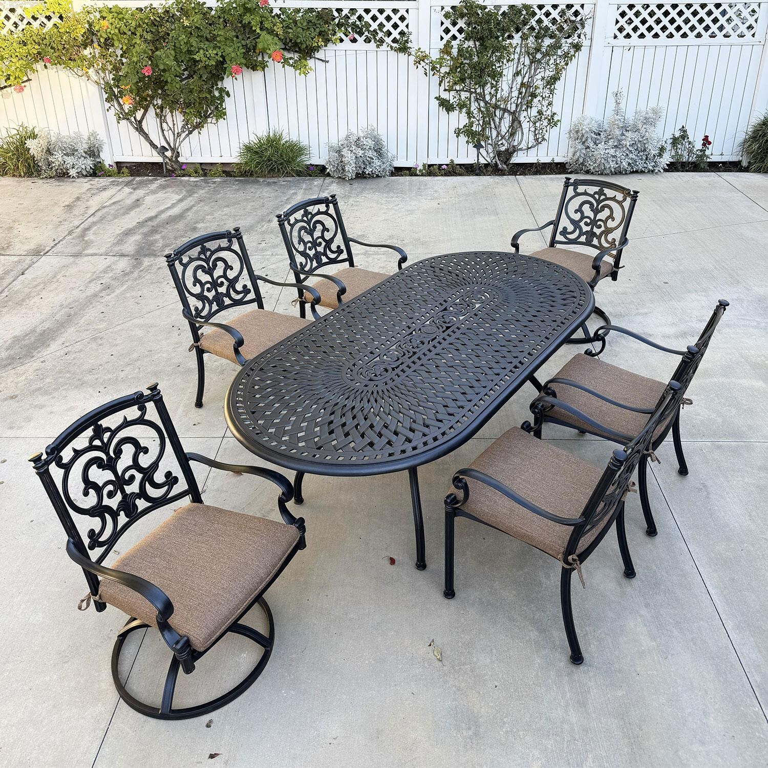 Santa Barbara 7 Pc Cast Aluminum Dining Set w/ 84 X 42 Inch Oval Series 60 Table & 2 Swivel Rockers in Antique Bronze/Sesame by Darlee