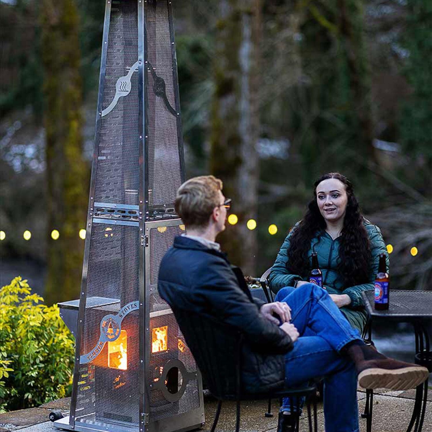 Timber Stoves WPPHLTESS1.0 Lil Timber Elite 72000 BTU Pellet Patio Heater Portable W/ Elite Safety Cage - Talking By Patio Heater - Lifestyle thumbnail