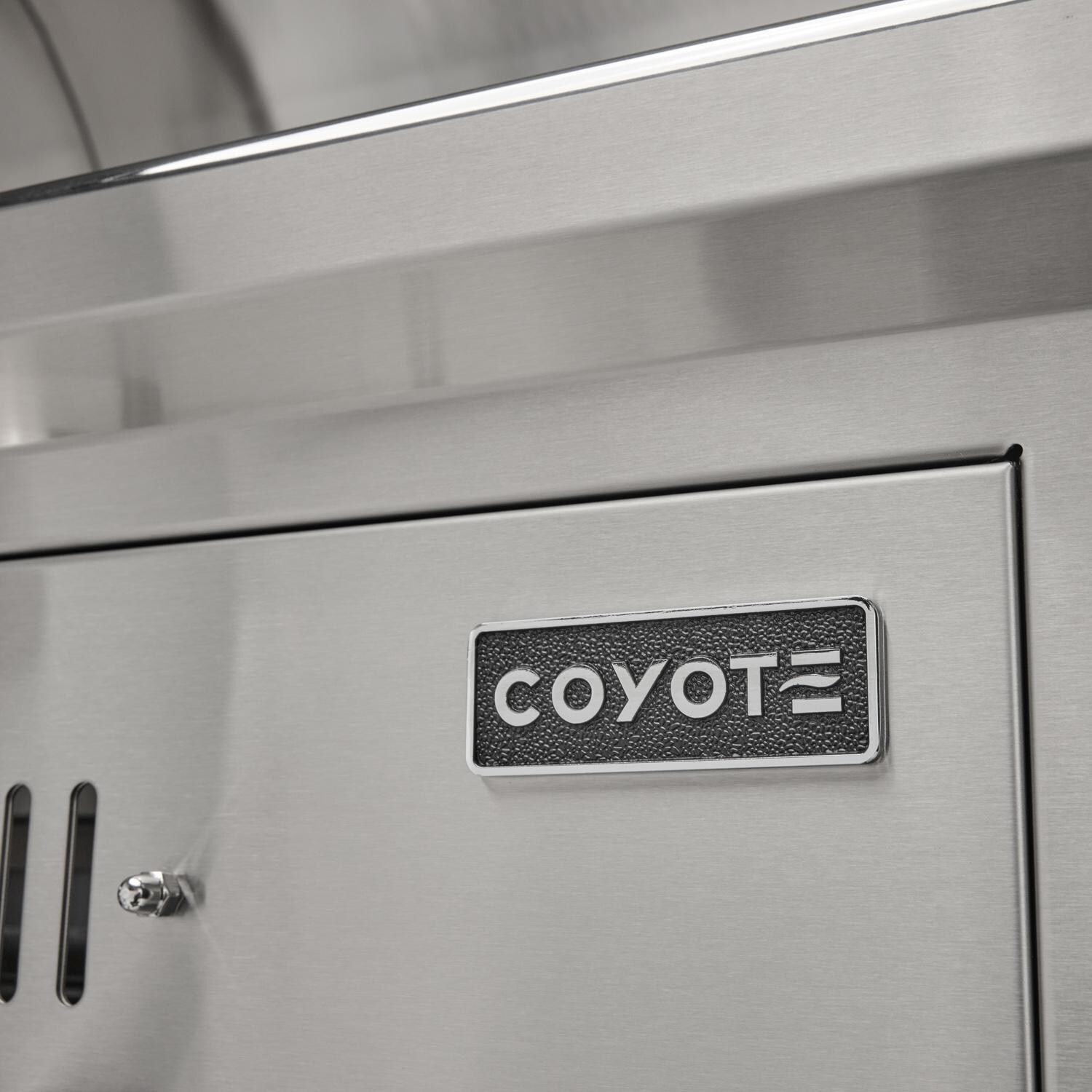 Coyote Outdoor Living Coyote 36 Inch Freestanding Charcoal Grill - Badge - Detail thumbnail