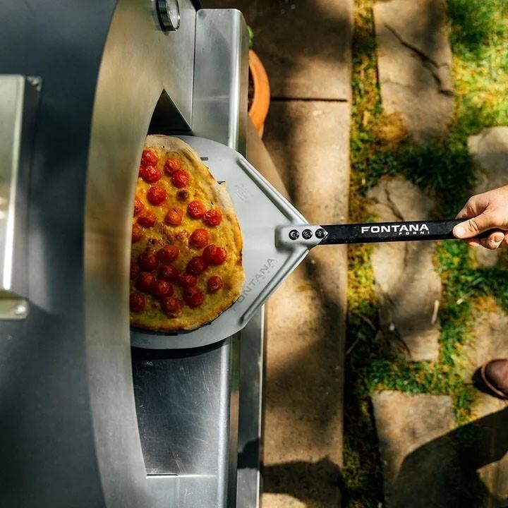 Fontana Forni FTMAR-R Margherita Wood-Fired - Red - Pulling Pizza Out - Lifestyle thumbnail