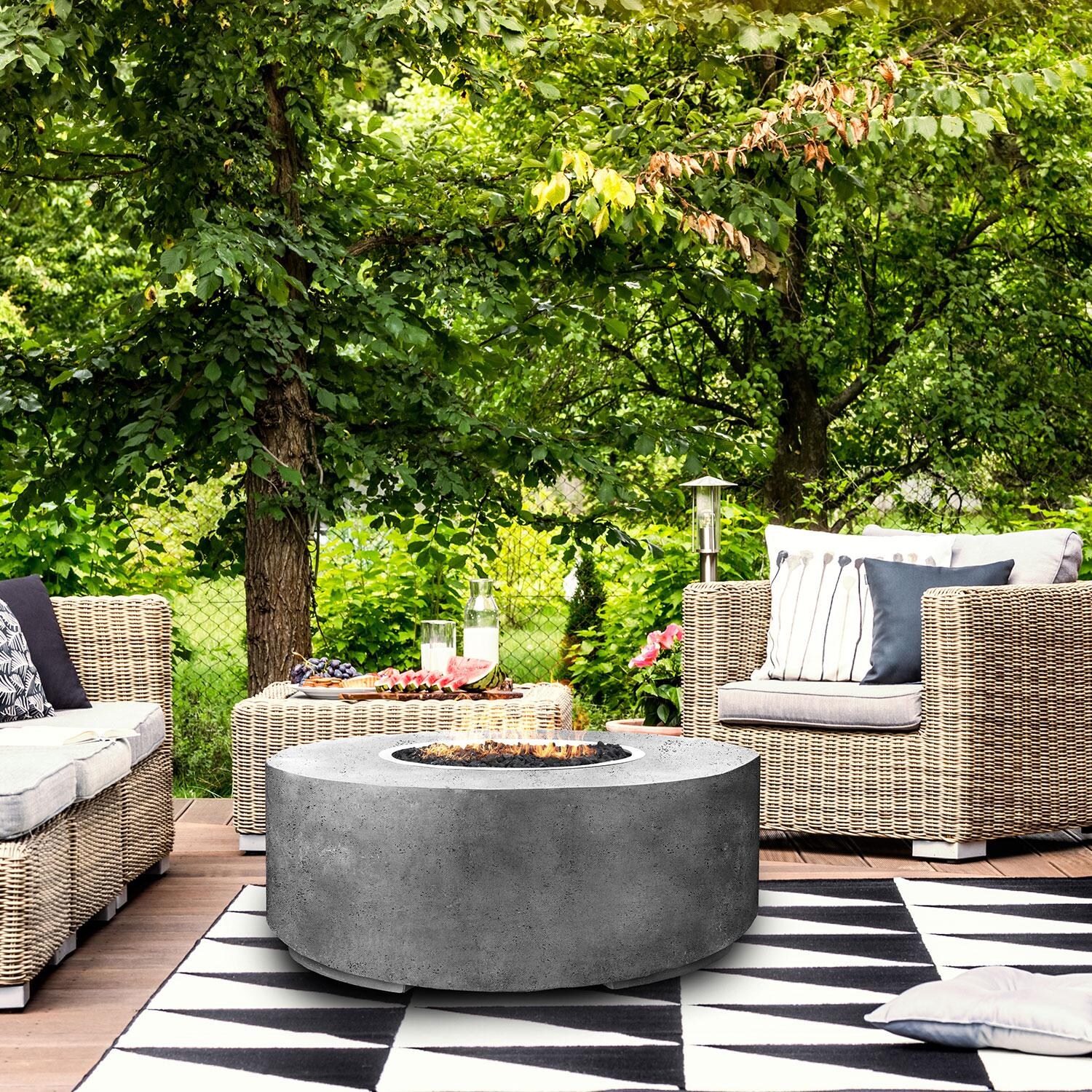 36-in Round Concrete Natural Gas Fire Pit in Limestone by XO Appliance - Backyard Patio - Shown in Gray finish - Lifestyle thumbnail