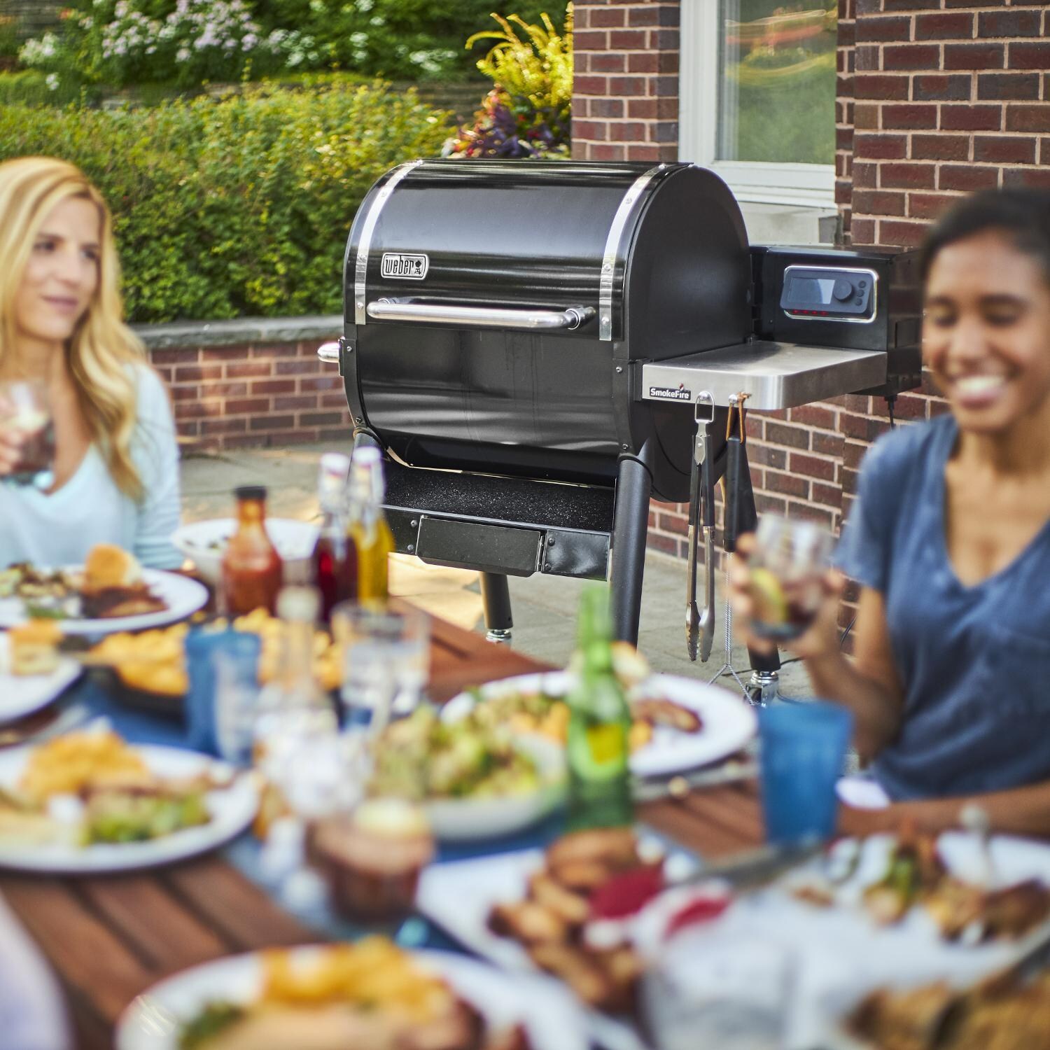 Weber 22510201 SmokeFire EX4 Gen 2 24-Inch Wi-Fi Enabled Wood Fired Pellet Grill - Party - Lifestyle thumbnail