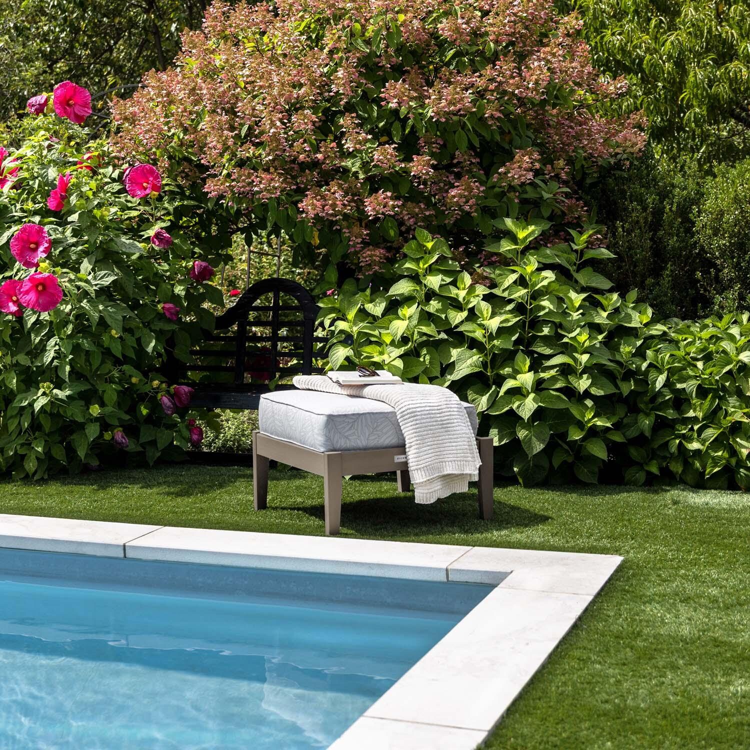 Blushing Bay Recycled Plastic Ottoman in Lively Parchment/Woodland Brown by Lakeview Outdoor Designs - By Pool - Lifestyle thumbnail