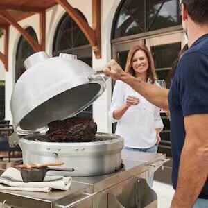 Blaze BLZ-20-KAMADO 20-Inch Cast Aluminum Kamado Grill on Stainless Steel Cart - Opening Grill - Lifestyle thumbnail