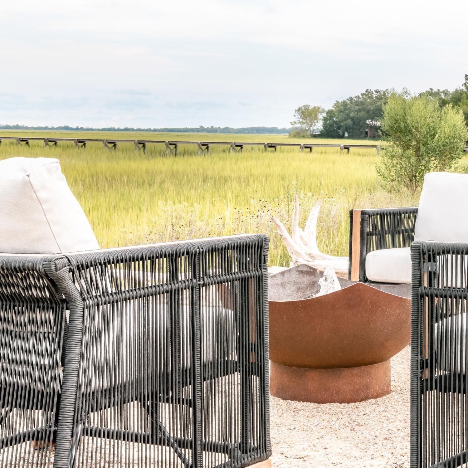 Teak + Table Breeze Olefin Rope & Teak Patio Club Chair in Charcoal/Natural - Around the Firepit Close-Up - Lifestyle thumbnail