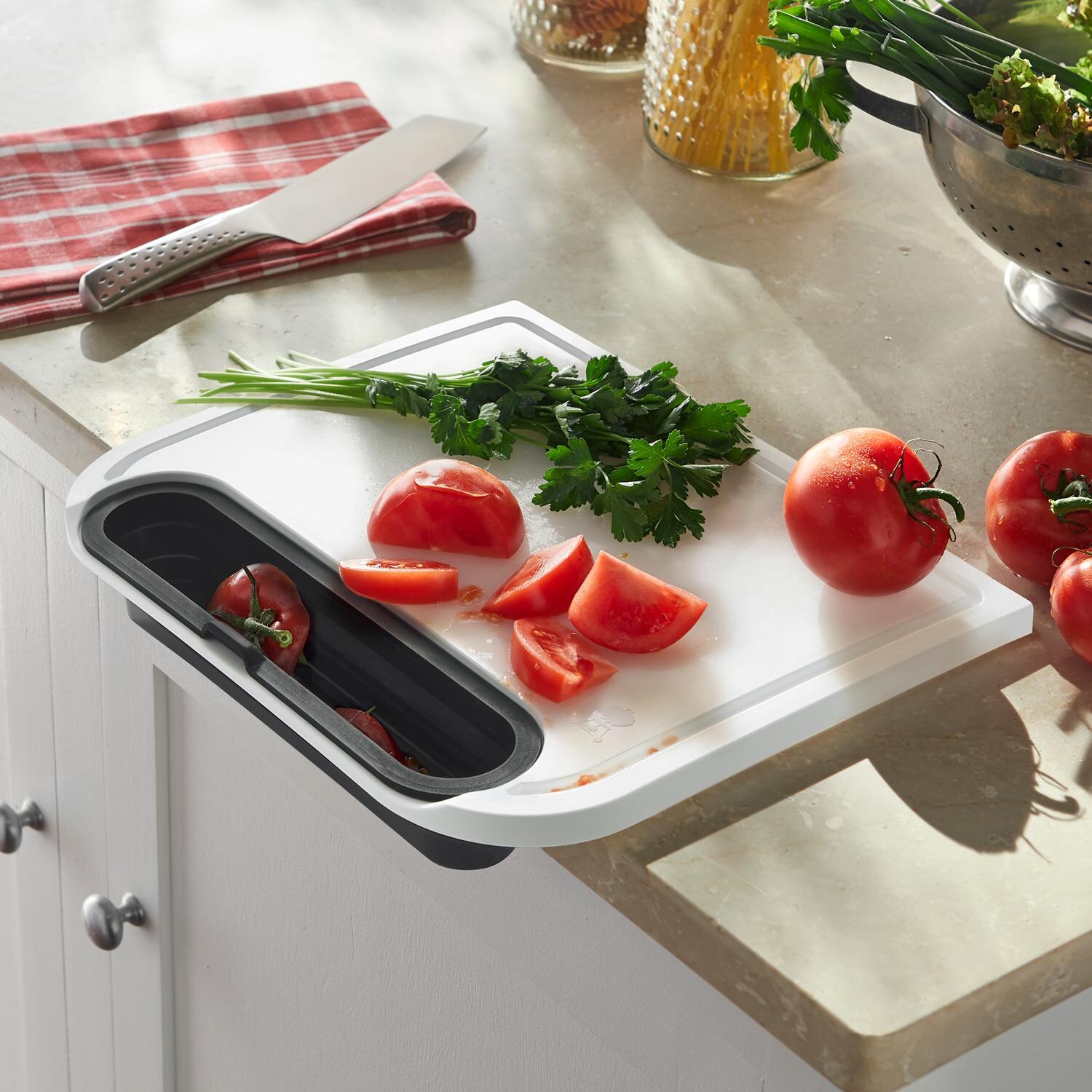 Weber 7032 Cut & Catch Cutting Board - In Use On A Counter Top thumbnail