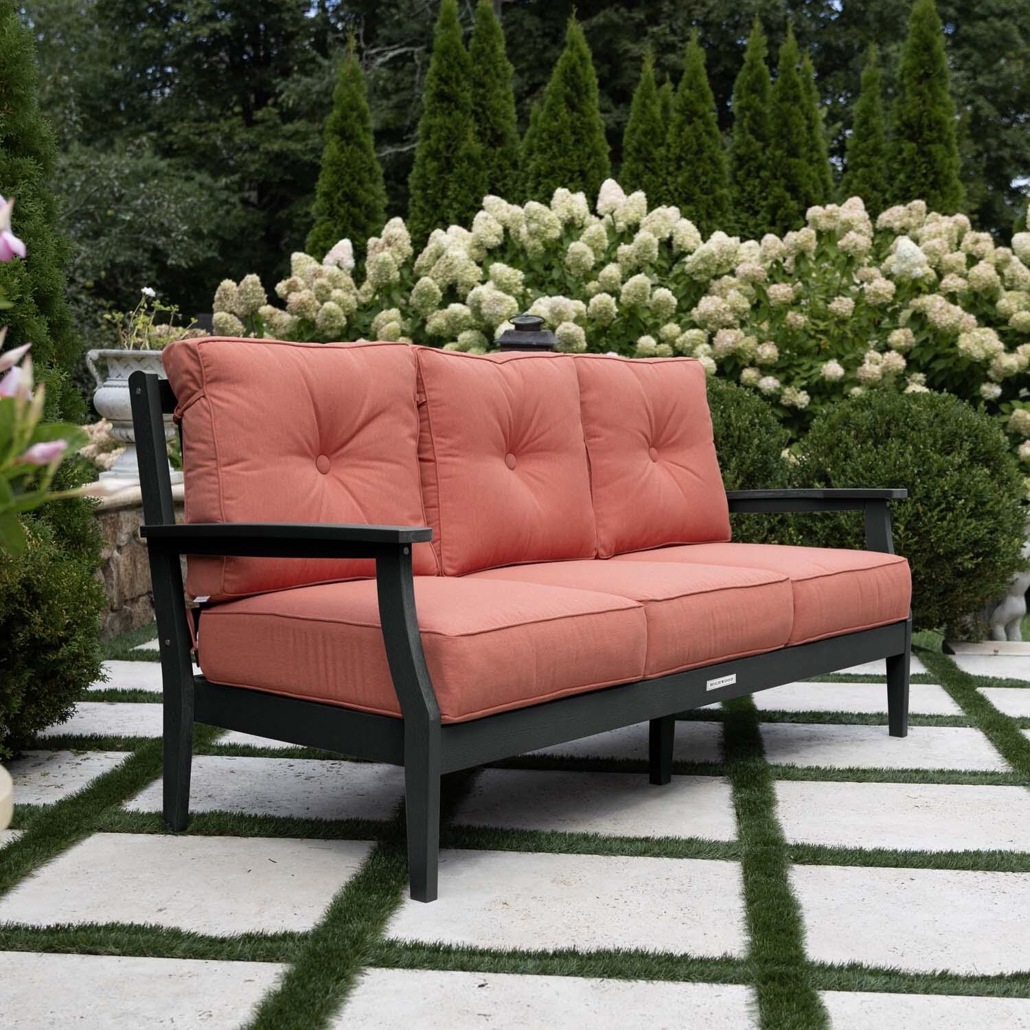 Blushing Bay 3 Person Recycled Plastic Sofa in Canvas Persimmon/Black by Lakeview Outdoor Designs - Side View - Lifestyle thumbnail