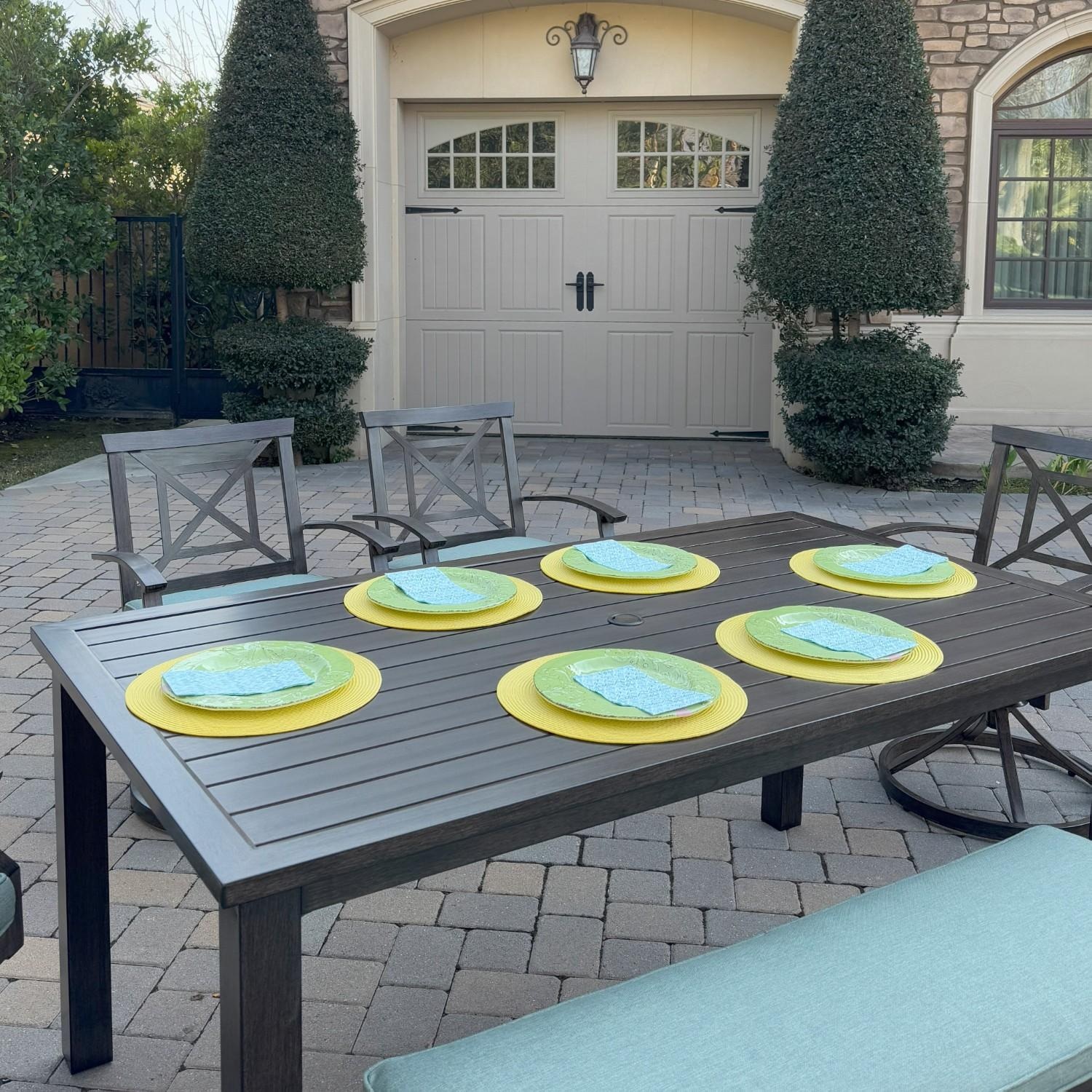 Atlantis 6 Pc Aluminum Dining Set w/ 4 Swivel Rocker Dining Arm Chairs & Two Person Bench in Walnut/Spa by Darlee - Table Angled - Lifestyle thumbnail