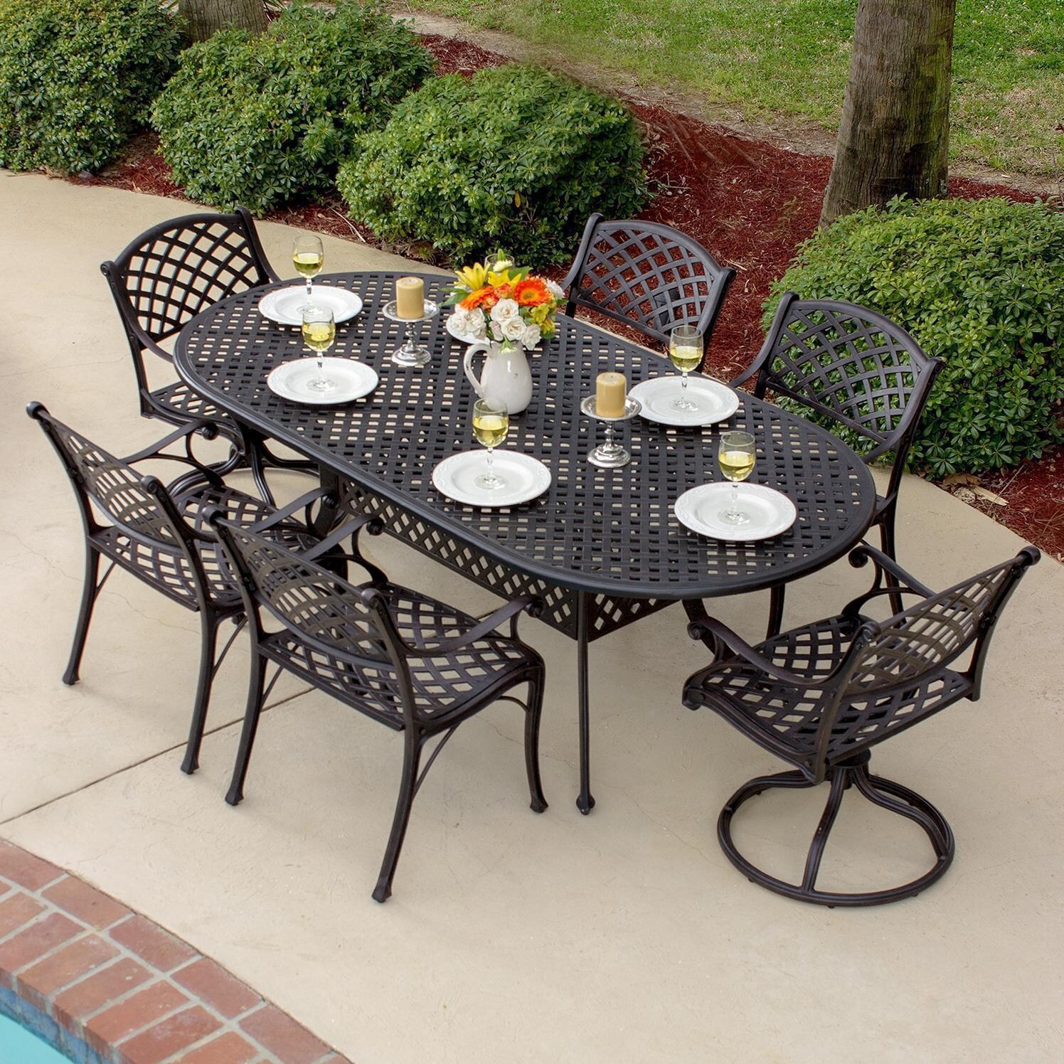 Heritage 7 Piece Cast Aluminum Patio Dining Set With 2 Swivel Rockers