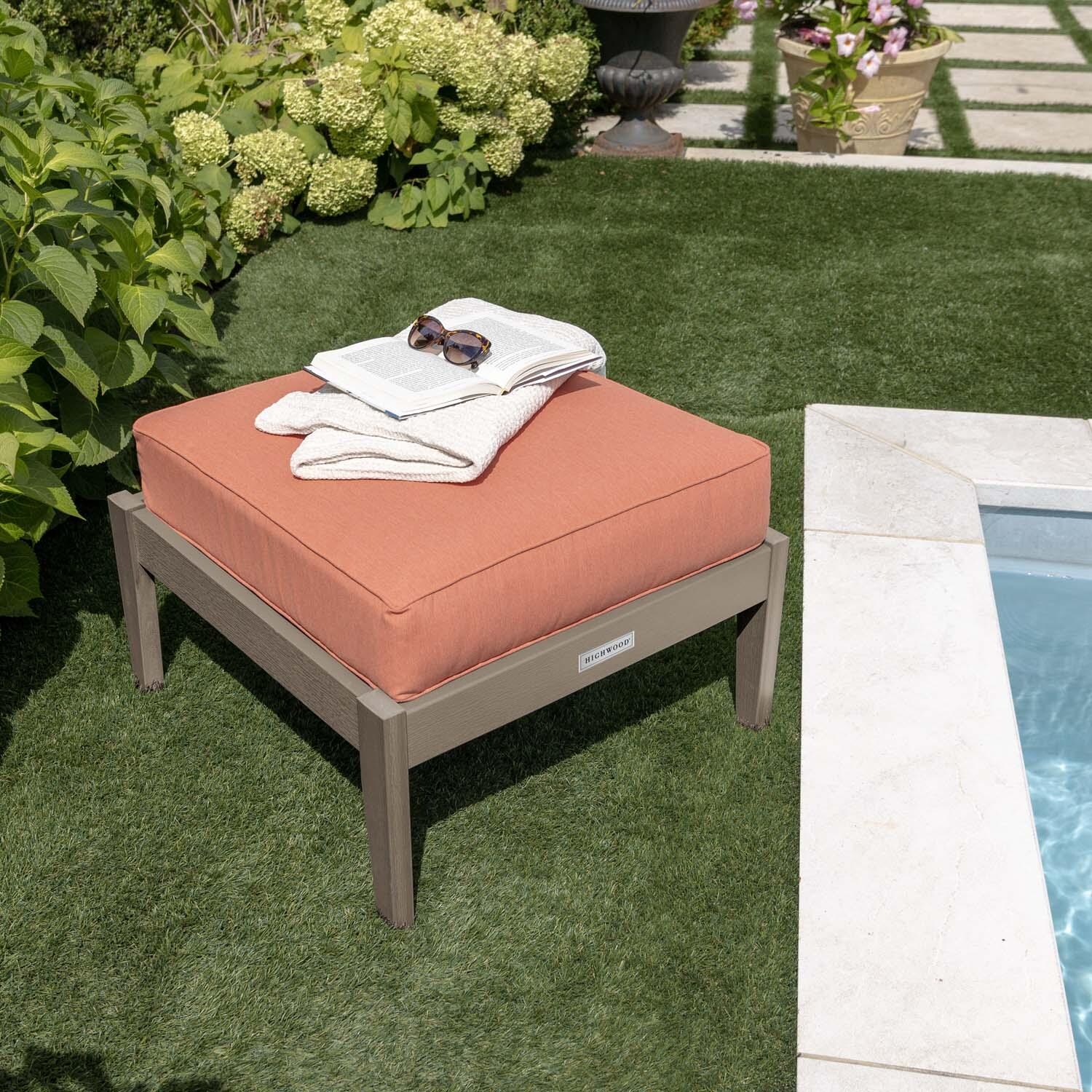 Blushing Bay Recycled Plastic Ottoman in Canvas Persimmon/Woodland Brown by Lakeview Outdoor Designs - By Pool Close Up - Lifestyle thumbnail