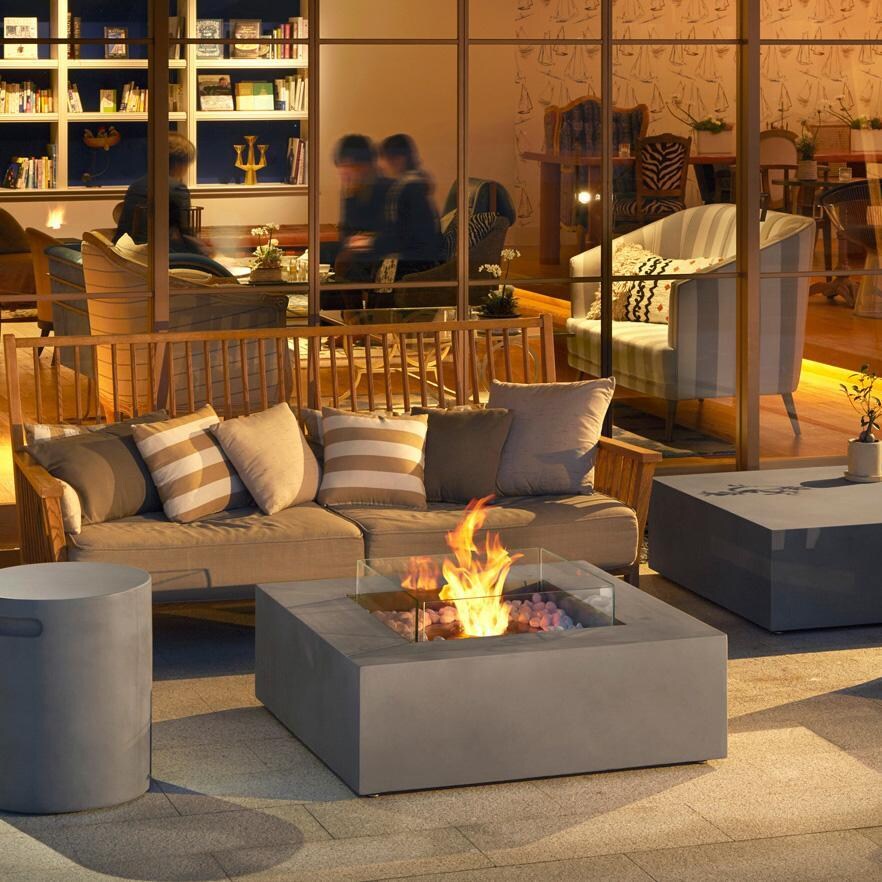 EcoSmart Fire ESF.O.BAS.40.NA Base 40 Inch Stainless Steel Burner Square Concrete Ethanol Fire Pit Table in Natural Concrete - On the Patio - Lifestyle thumbnail