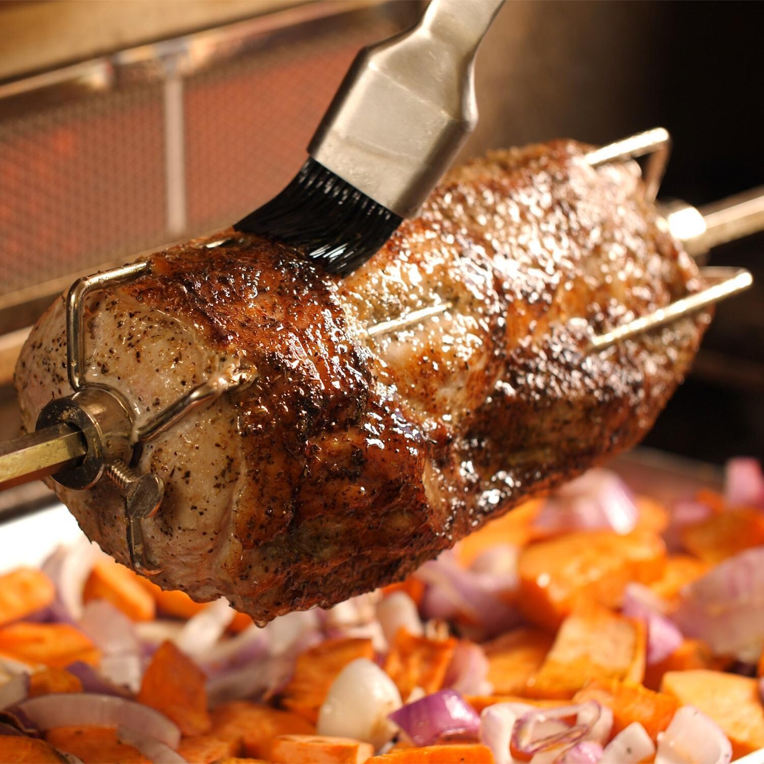 Lion 40-Inch L90000 Gas Grill - Basting Meat On The Rotisserie - Lifestyle thumbnail