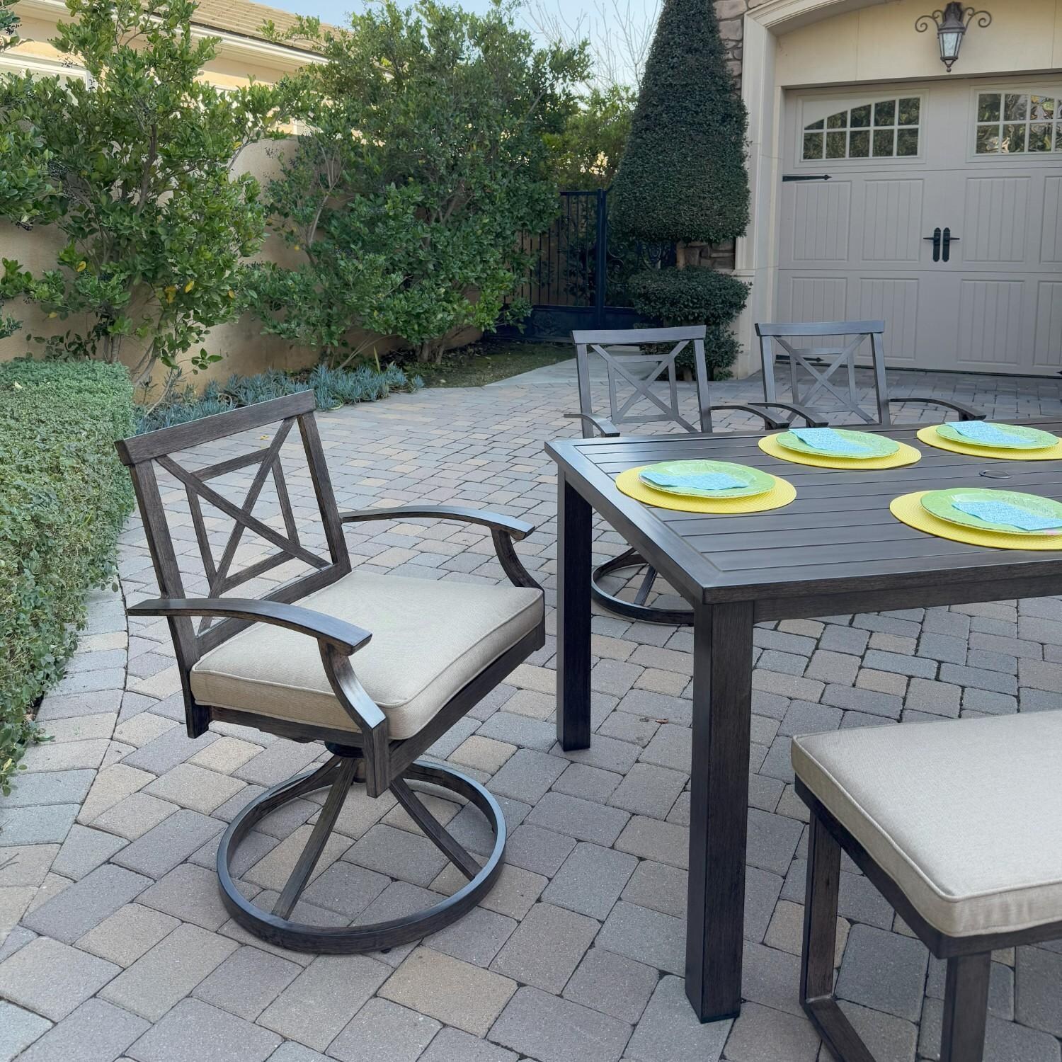 Atlantis 6 Pc Aluminum Dining Set w/ 4 Swivel Rocker Dining Arm Chairs & Two Person Bench in Walnut/Beige by Darlee - Chair At Table - Lifestyle thumbnail