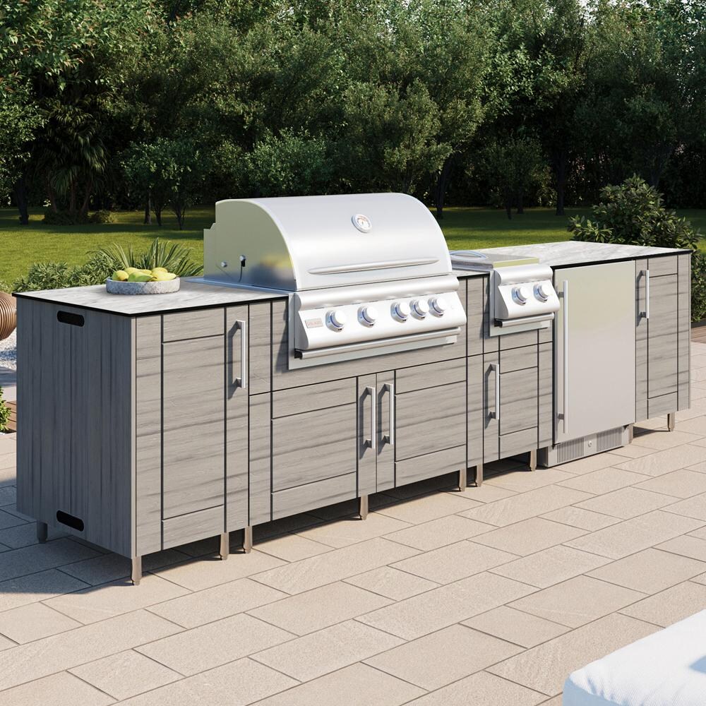 WeatherStrong Nassau 10 1/2 Ft Outdoor Kitchen Island w/ Lynx Natural Gas Grill, Side Burner & Refrigerator in Dark Ash/Glacier Frost - On Patio - Lifestyle thumbnail