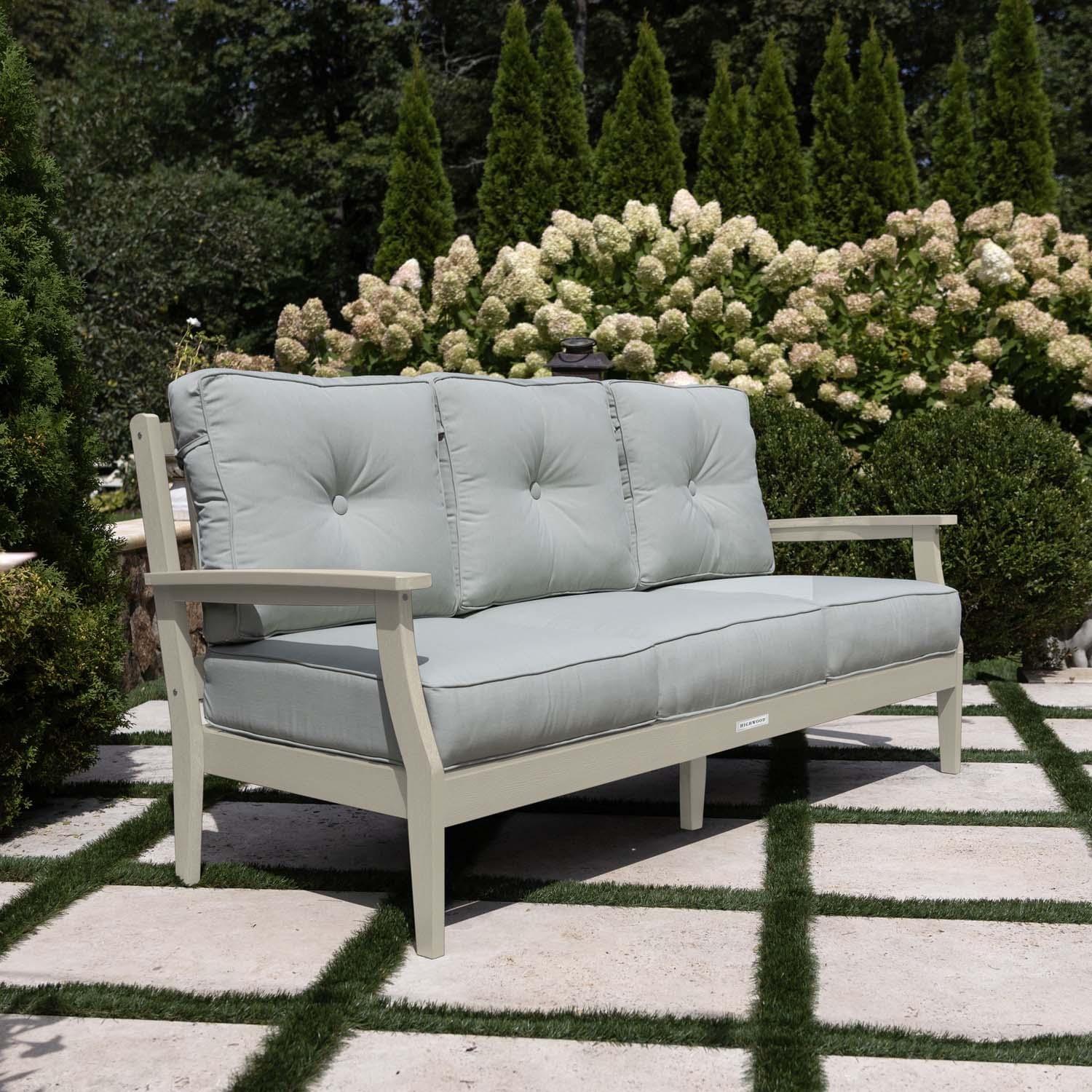 Blushing Bay 3 Person Recycled Plastic Sofa in Canvas Seasalt/Whitewash by Lakeview Outdoor Designs - Side View - Lifestyle thumbnail