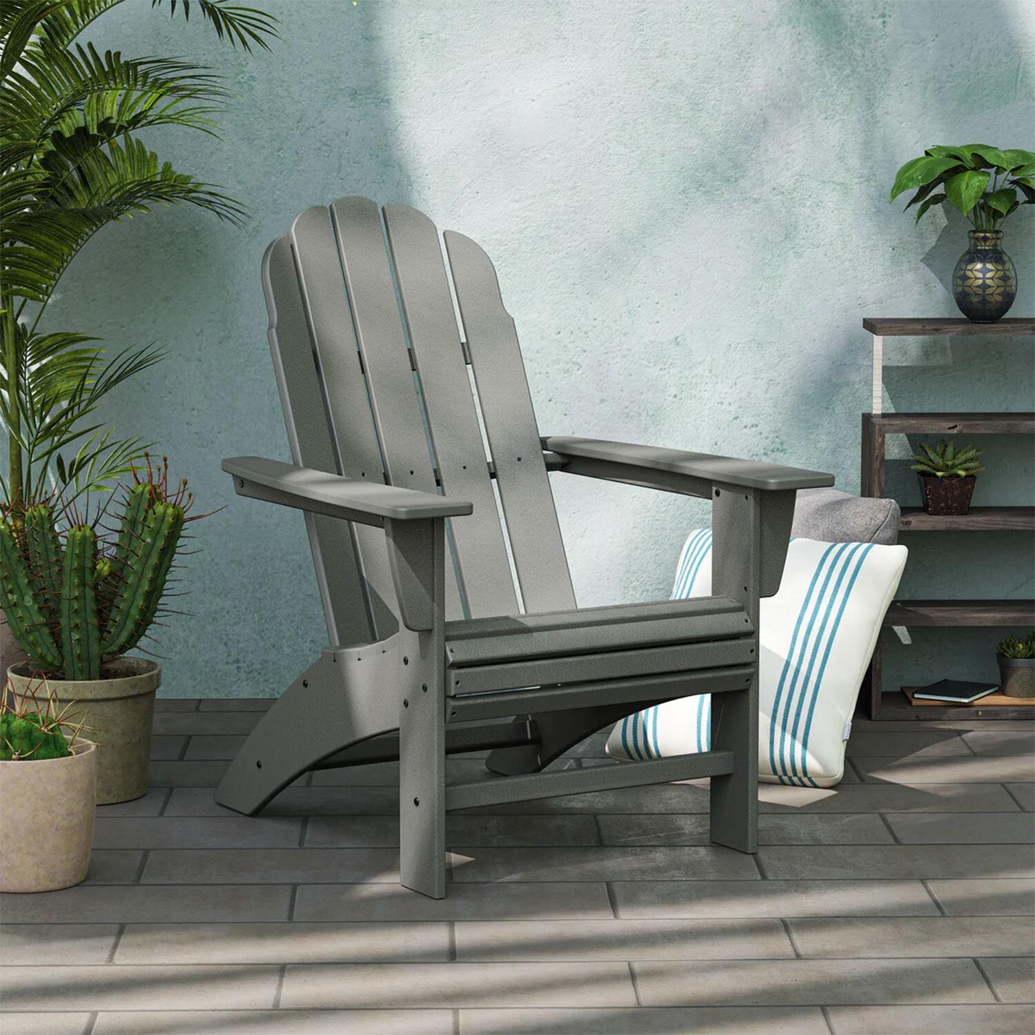 POLYWOOD Vineyard Curveback Adirondack Chair - Sand - Back Patio - Shown in Slate Gray finish - Lifestyle