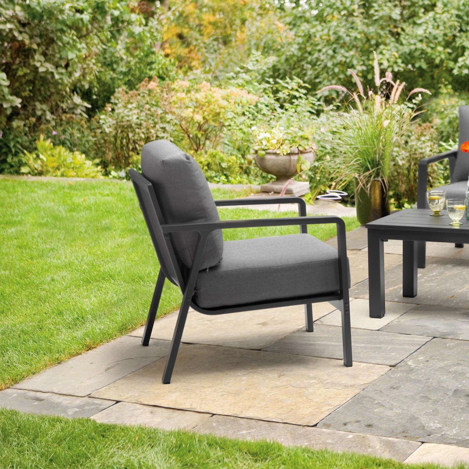 Paros Aluminum Club Chair w/ Charcoal Grey Cushions By KETTLER - Left-Side View - Lifestyle thumbnail