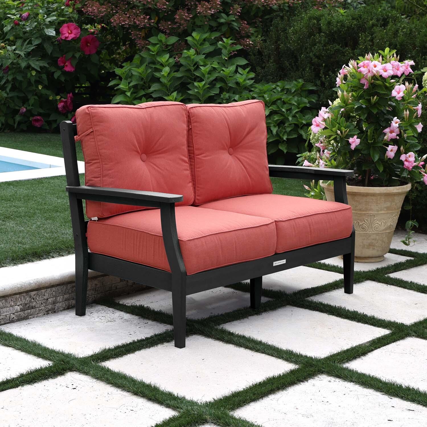 Blushing Bay 2 Person Recycled Plastic Loveseat in Canvas Persimmon/Black by Lakeview Outdoor Designs - Left Angled - Lifestyle thumbnail