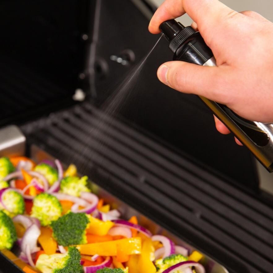 Broil King Stainless Steel Oil Spritzer - 60945 - Spraying Food - Lifestyle thumbnail