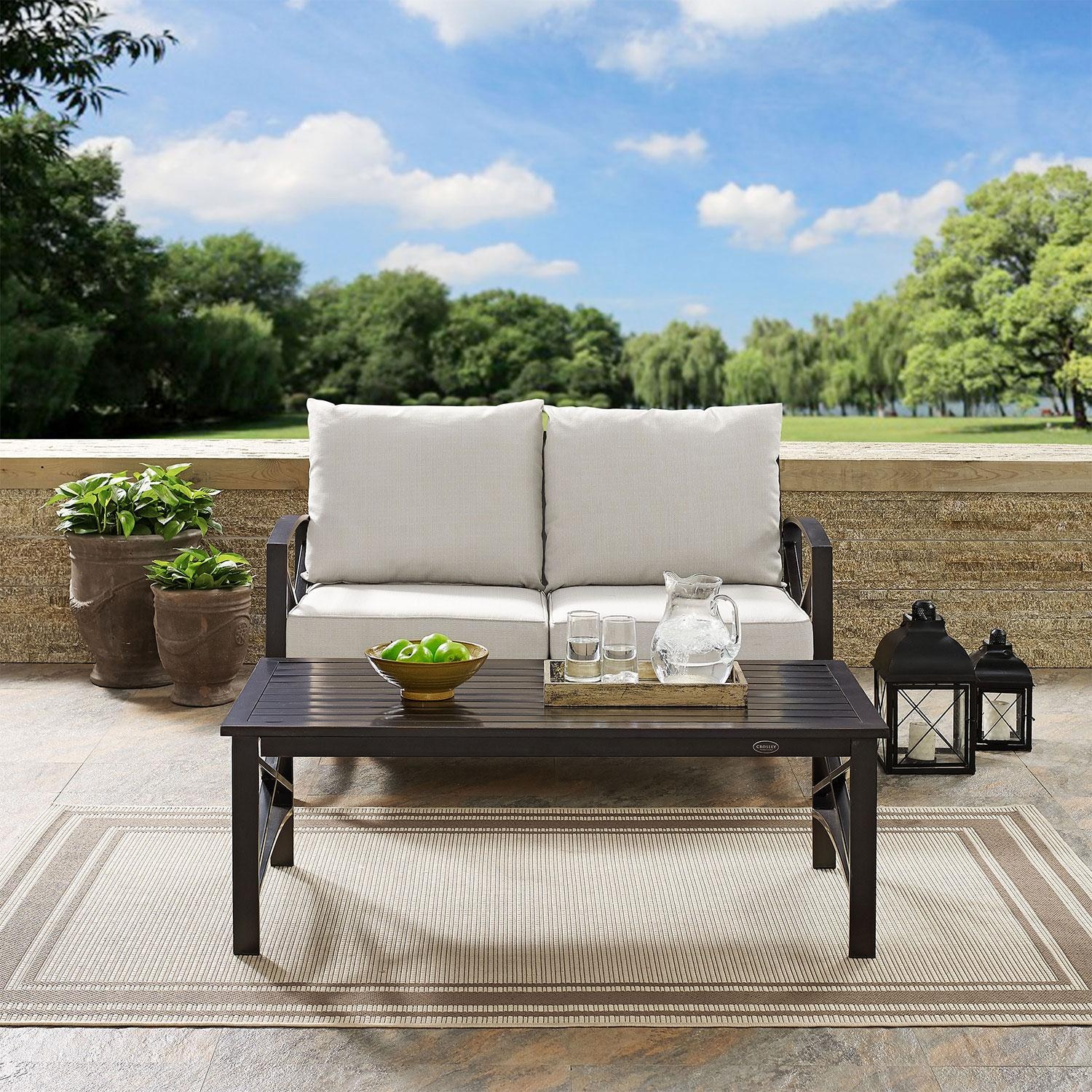 Ultimate Patio UP-82243BZ-OL 2Pc Outdoor Loveseat Patio Furniture Set in Oatmeal - On Patio - Lifestyle thumbnail