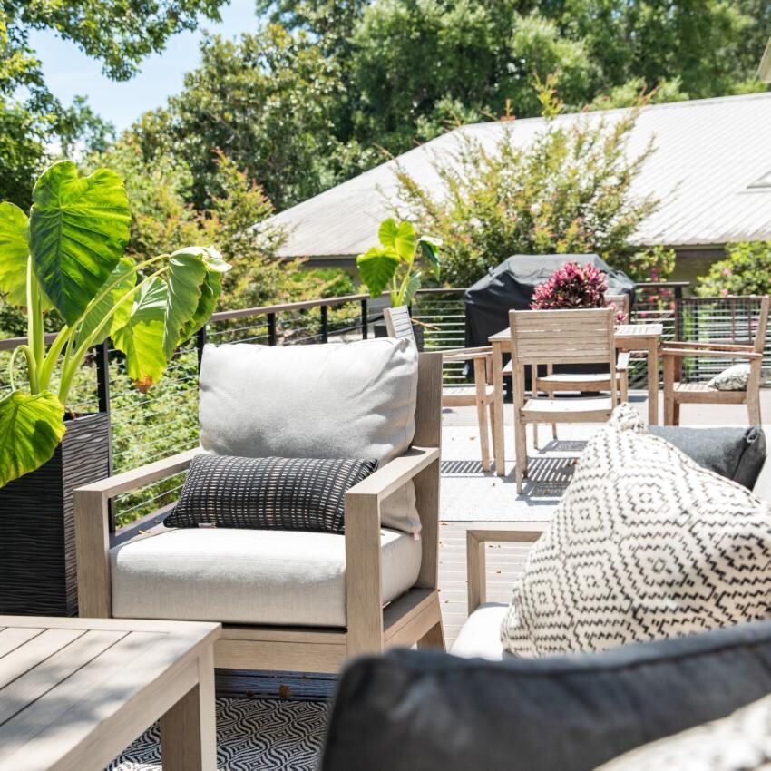 Laguna Aluminum Club Chair w/ No Welt in Driftwood/Canvas Natural by Sunset West - Shown w/ Companion Pieces on Porch - Lifestyle thumbnail