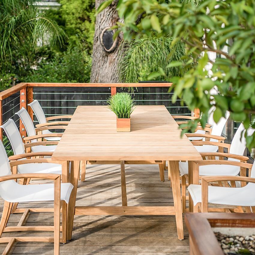 Teak + Table Capri Sling Dining Chair in Black - On Deck - Lifestyle thumbnail