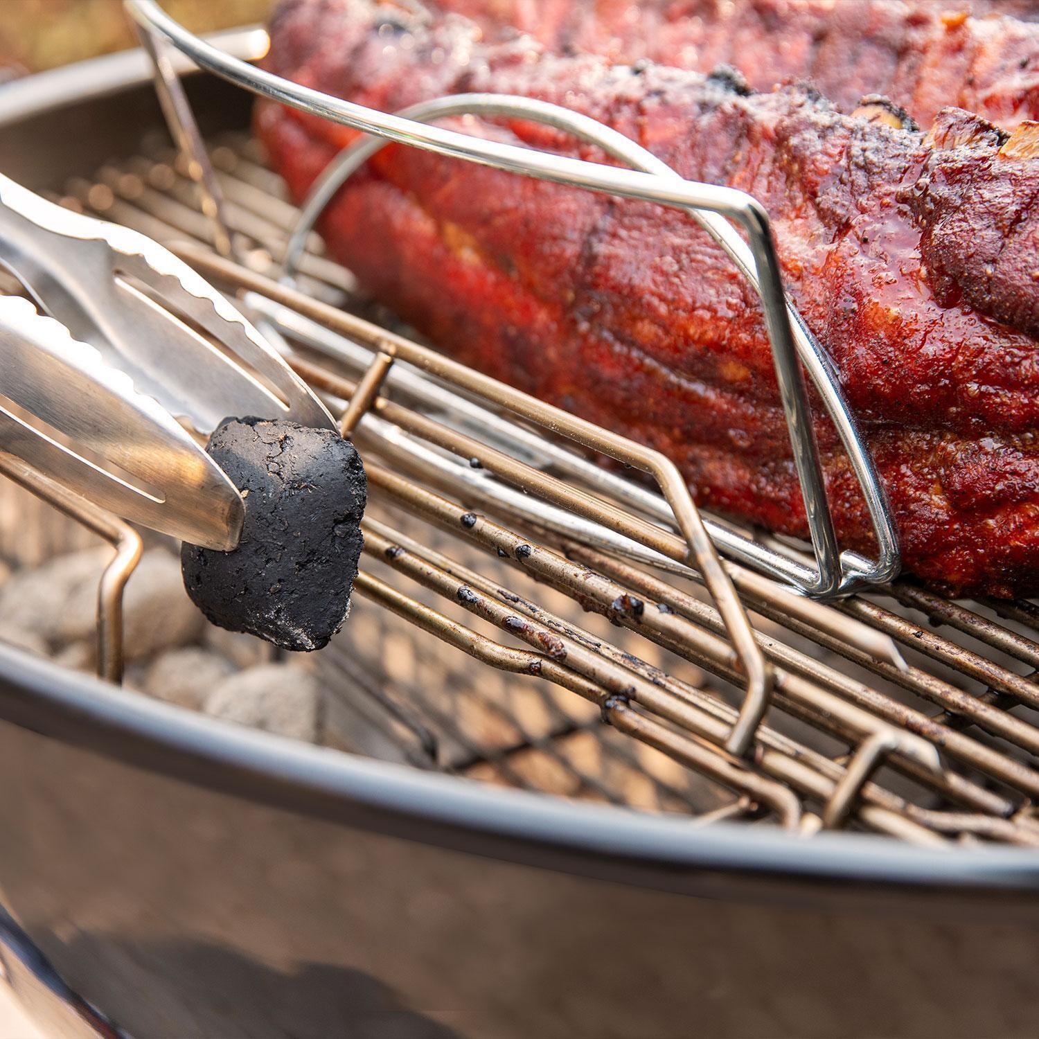 Weber 1500065 Master Touch 26-Inch Charcoal Grill With Gourmet BBQ System Cooking Grate in Smoke - Inserting Extra Charcoal for Grilling - Lifestyle thumbnail