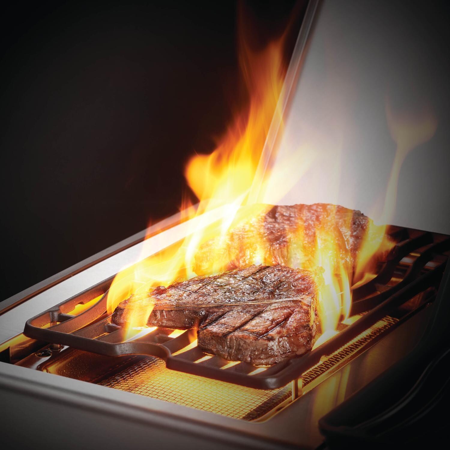 Napoleon RSE425RSIBPSS-1 Rogue SE 425 Propane Gas Grill with Infrared Rear Burner and Infrared Side Burner - Stainless Steel - Searing Steaks On The Infrared Sizzle Zone Side Burner thumbnail