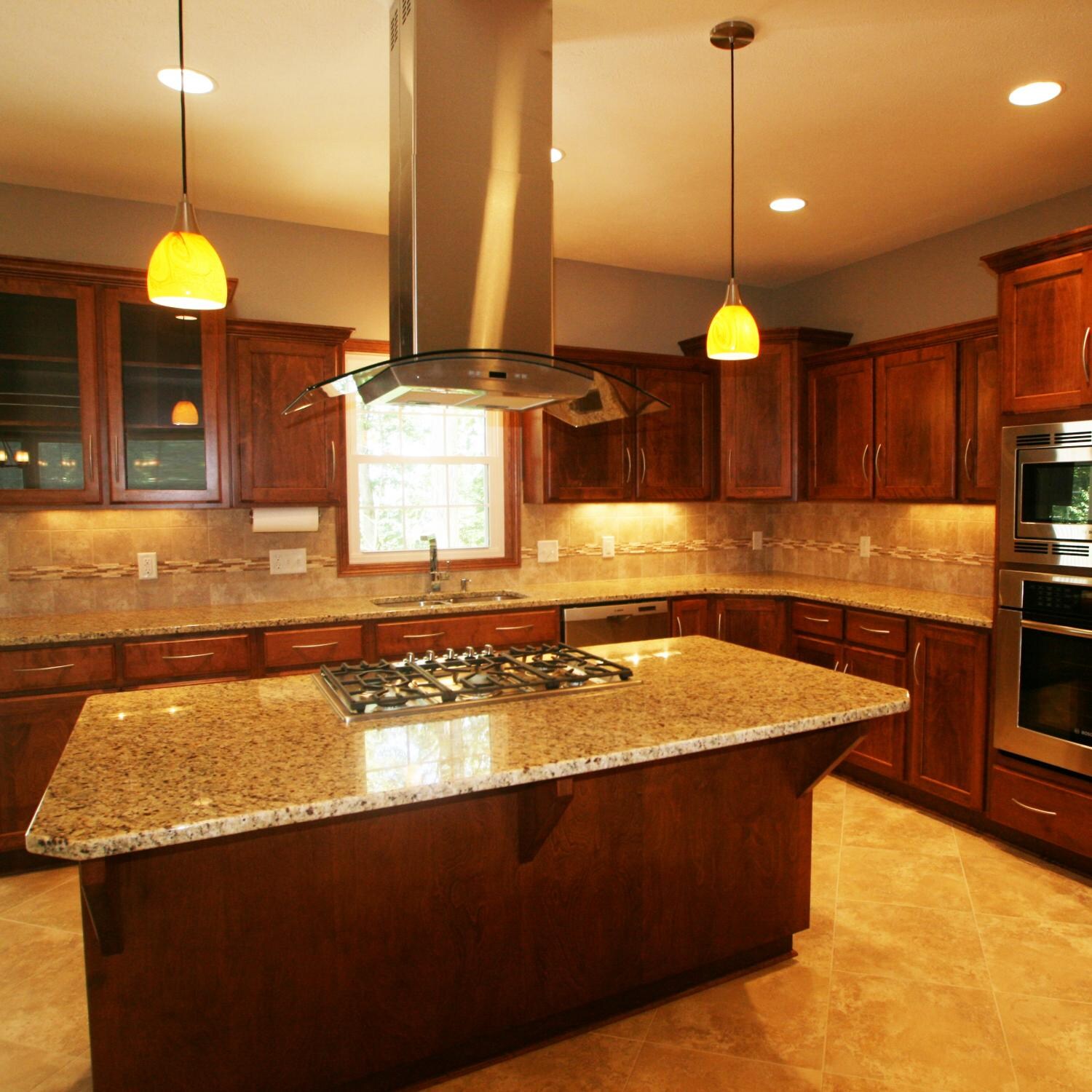 Cavaliere 30-Inch 900 CFM Island Mounted Range Hood With Glass Canopy - Installed thumbnail