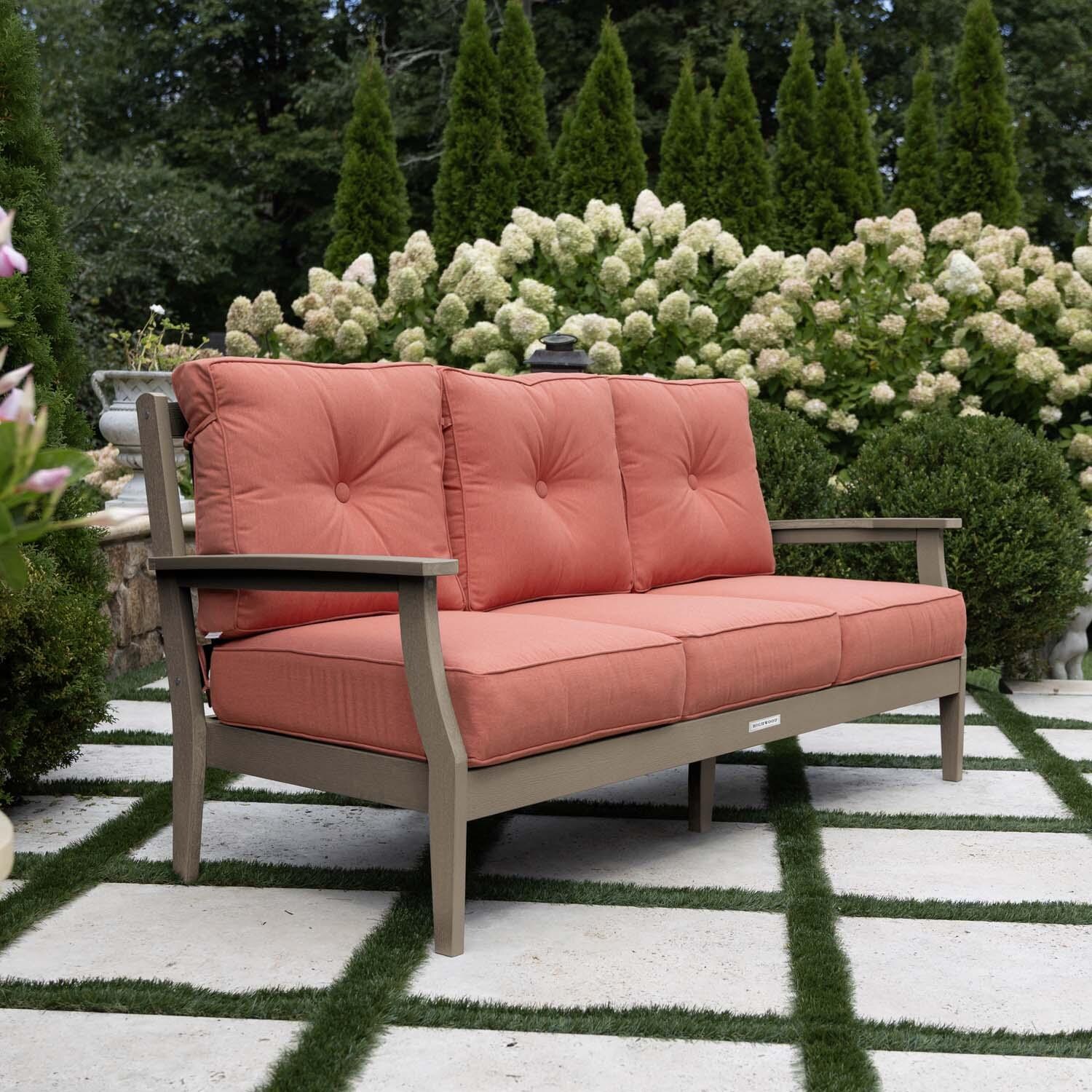 Blushing Bay 3 Person Recycled Plastic Sofa in Canvas Persimmon/Woodland Brown by Lakeview Outdoor Designs - Side View - Lifestyle thumbnail