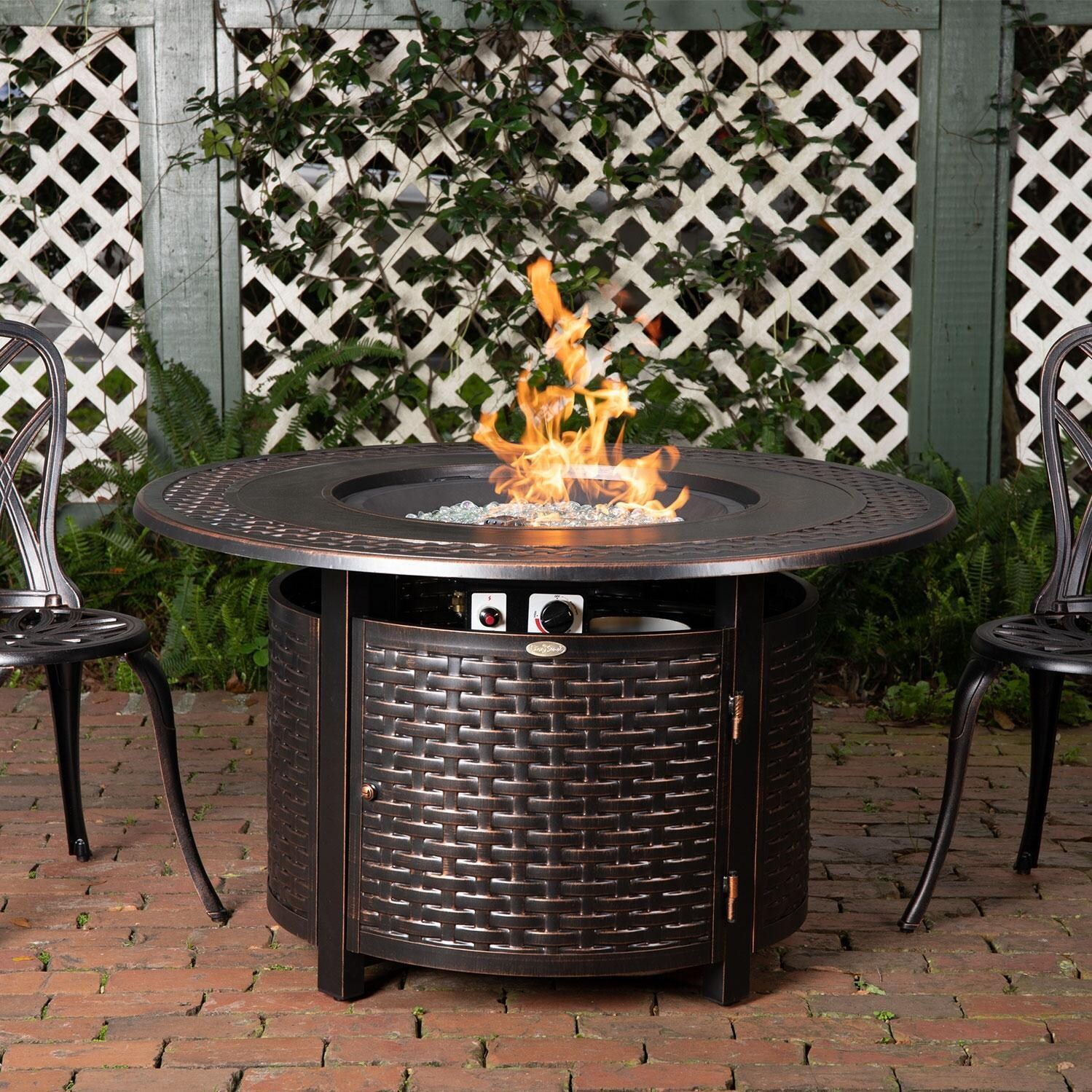 Ultimate Patio Welcome View 50,000 BTU Propane Round Fire Pit Table - Woven Cast Aluminum - On Patio - Lifestyle thumbnail