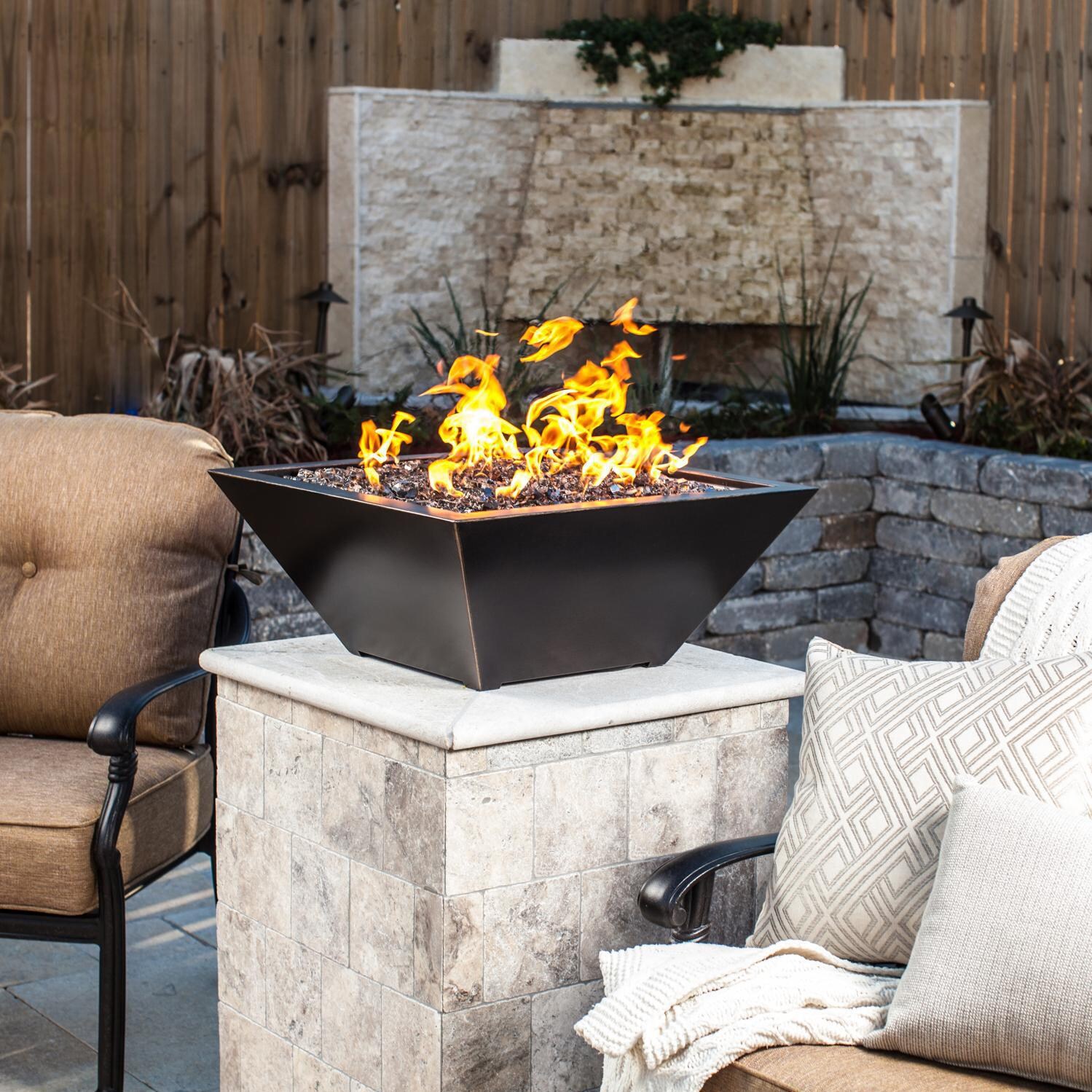 BBQGuys Signature Series Westfalen 24-Inch Square High-Rise Natural Gas Fire Bowl - Oil Rubbed Bronze - Lifestyle - Shown with 1/2 inch Monochrome Gray Reflective Fire Glass thumbnail