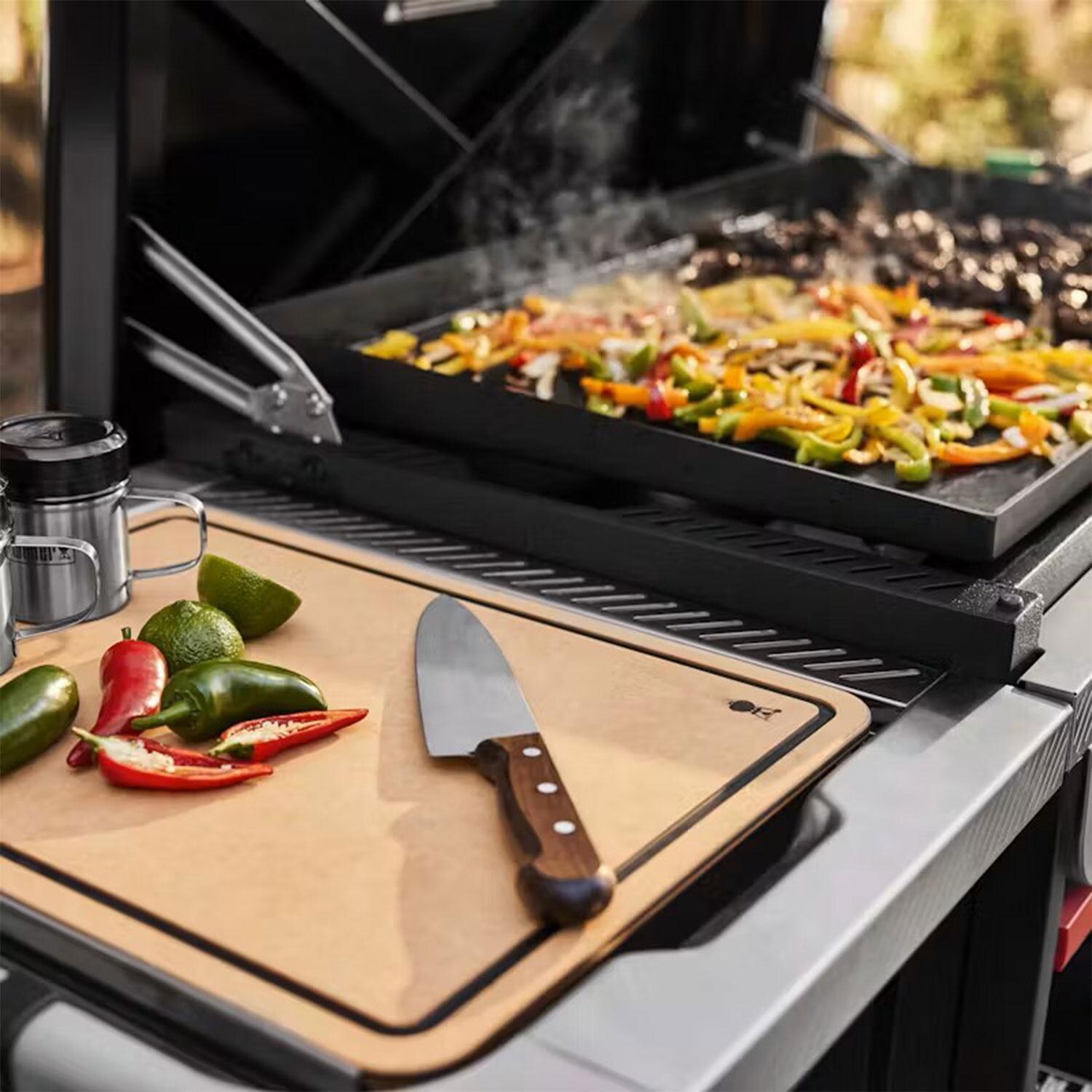 Weber 1500216 Slate 36 Inch Rust-Resistant Propane Griddle - Peppers Searing on Griddle - Lifestyle thumbnail
