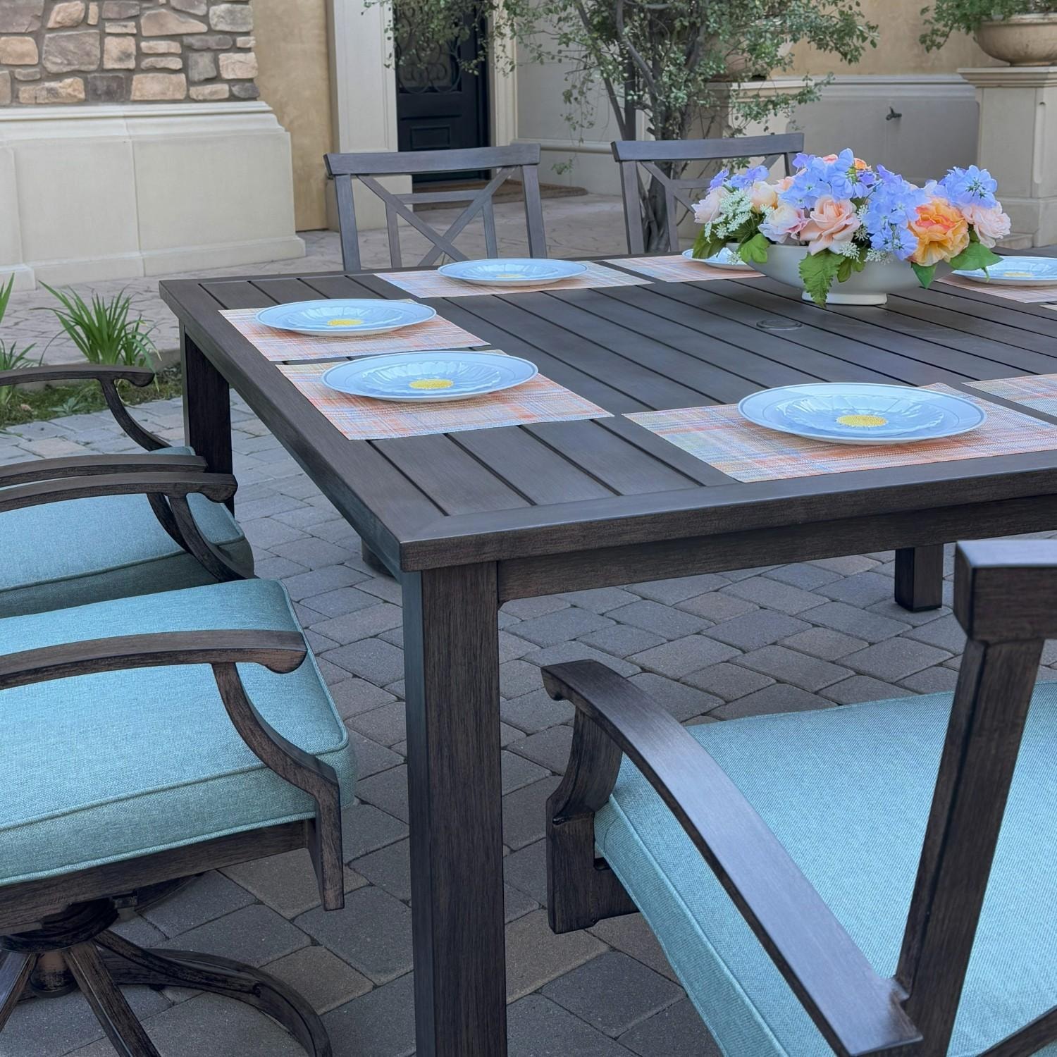 Atlantis 9 Pc Aluminum Dining Set w/ 8 Swivel Rocker Dining Arm Chairs in Walnut/Spa by Darlee - Chairs At Table - Lifestyle thumbnail