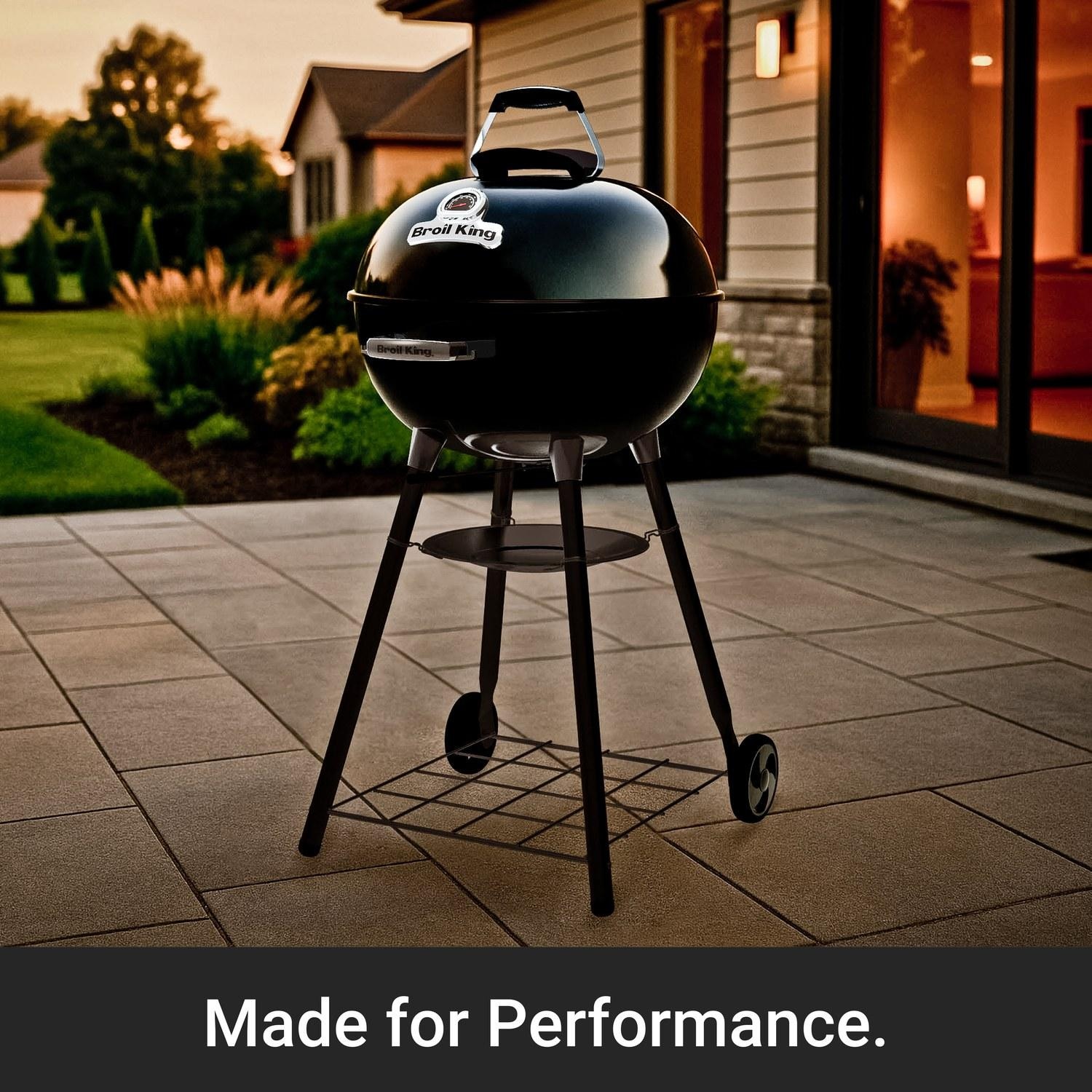 Broil King 401010 Kettle 22 1/2-in Charcoal Grill - Black - Backyard Setting - Lifestyle thumbnail