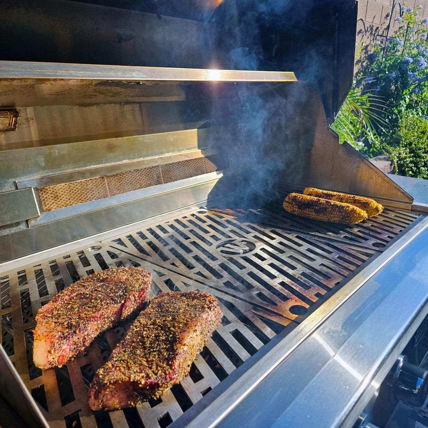 Wildfire Ranch Pro 42-in 304 SS Natural Gas Grill w/ Freestanding Cart - Steaks & Corn on Grill - Lifestyle thumbnail