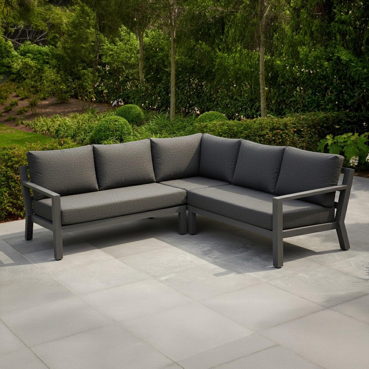 Timber 4 Pc Aluminum Sectional Set in Lava / Natte Charcoal - Sectional on Patio - Lifestyle thumbnail