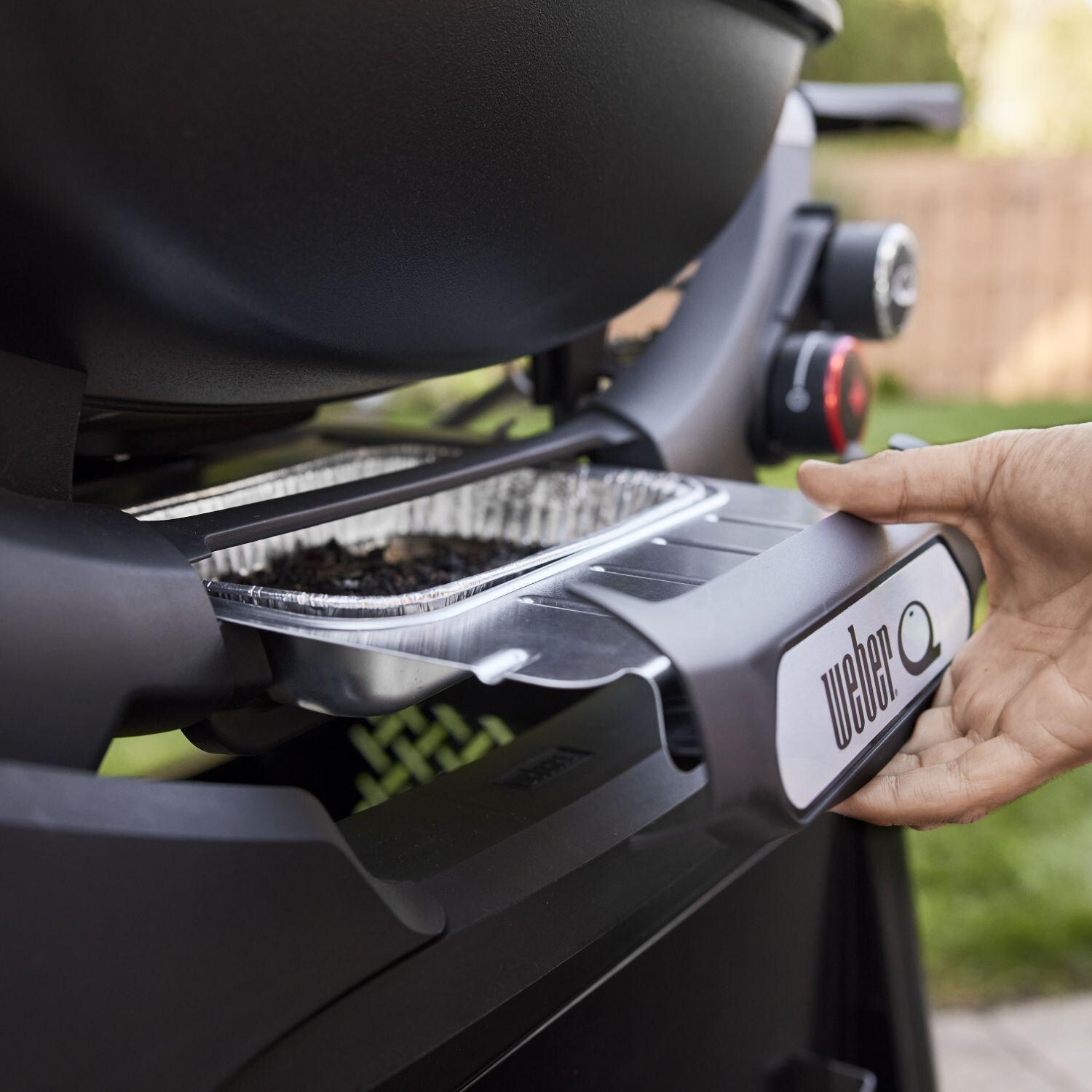 Weber 1500375 Q2800N+ Portable Propane Gas Grill in Midnight Black - Grease Tray Shown in Charcoal Gray - Detail thumbnail