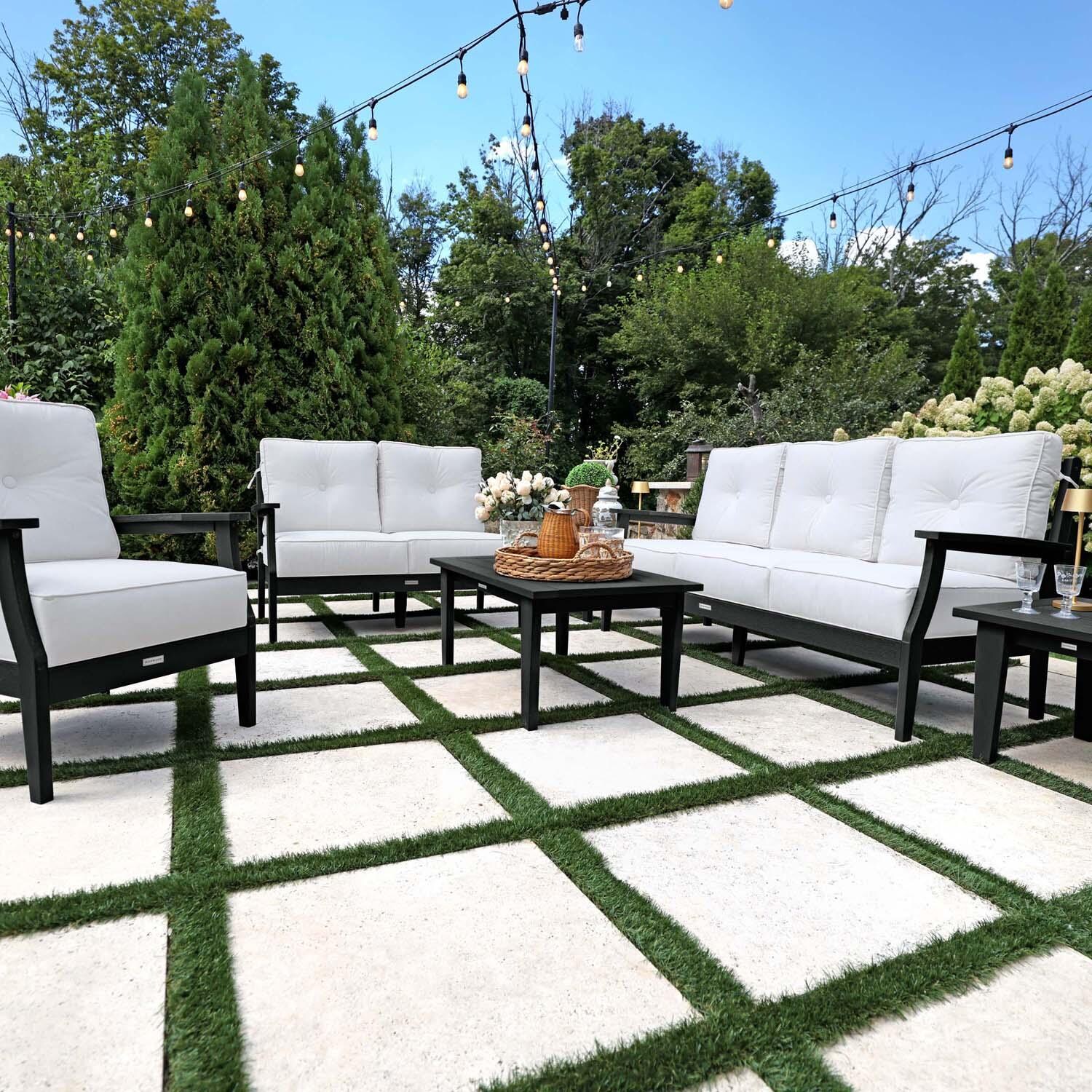 Blushing Bay 6 Pc Recycled Plastic Grand Seating Set in Bliss Linen/Black by Lakeview Outdoor Designs - Front View - Lifestyle thumbnail
