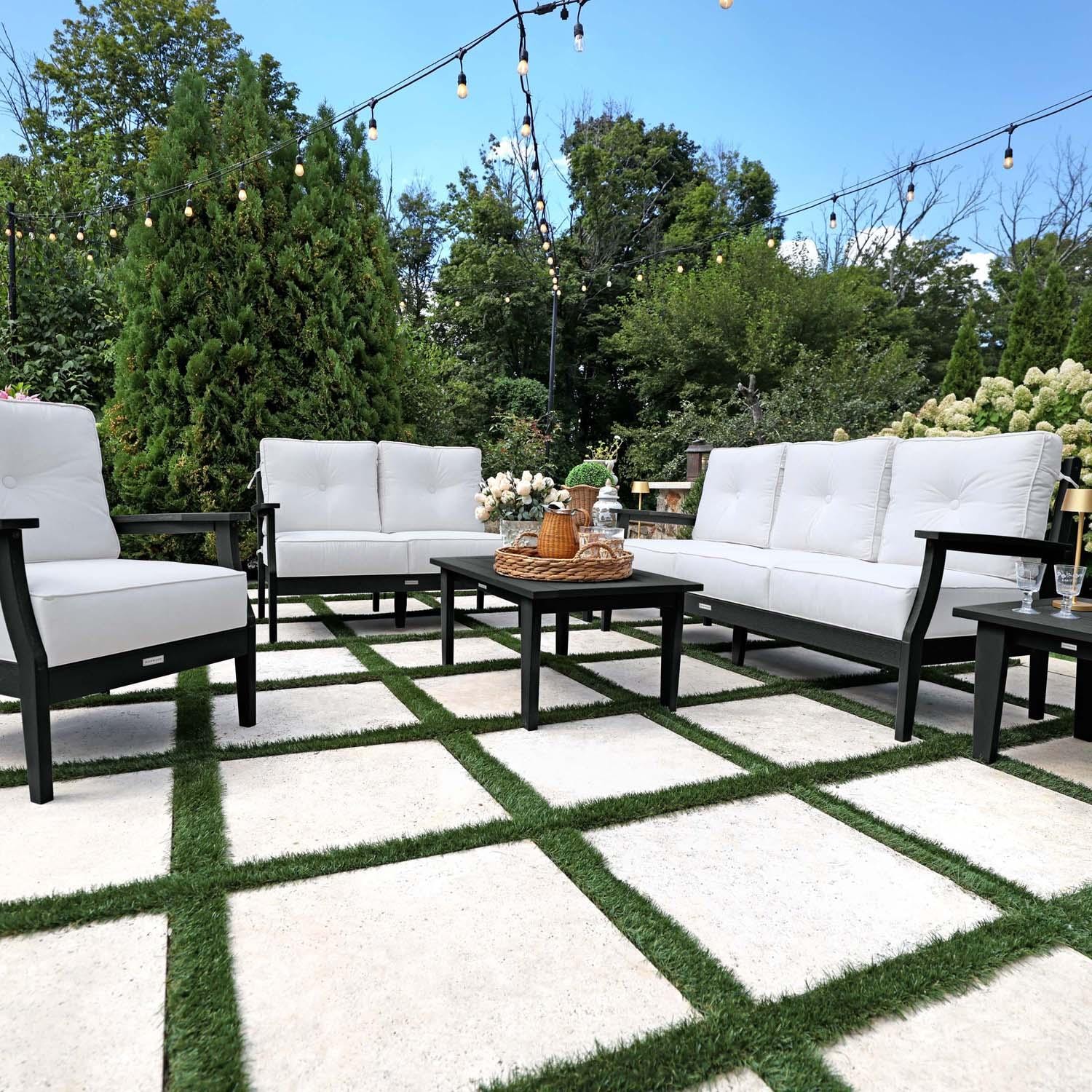 Blushing Bay 6 Pc Recycled Plastic Grand Seating Set in Bliss Linen/Black by Lakeview Outdoor Designs - Front View - Lifestyle thumbnail